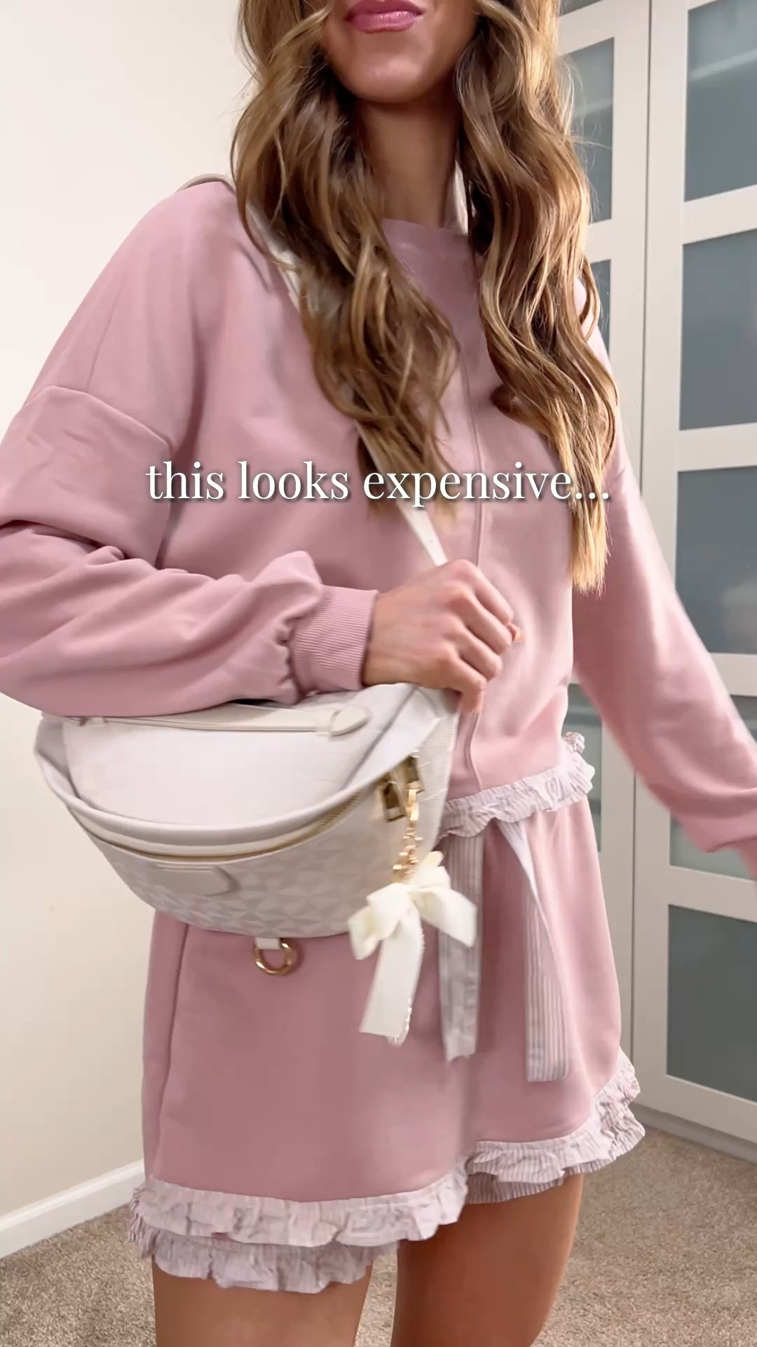 Can't go wrong with shorts and sweaters outfits for transitional weather! So cozy and chic! I love this lounge set with my go-to crossbody bag. It's perfect for a relaxing day at home or a casual outing. Can't wait to style it more ways!
>I'm wearing a size small in the pink color option.

 

 #LTKootd #LTKSeasonal #LTKOver40