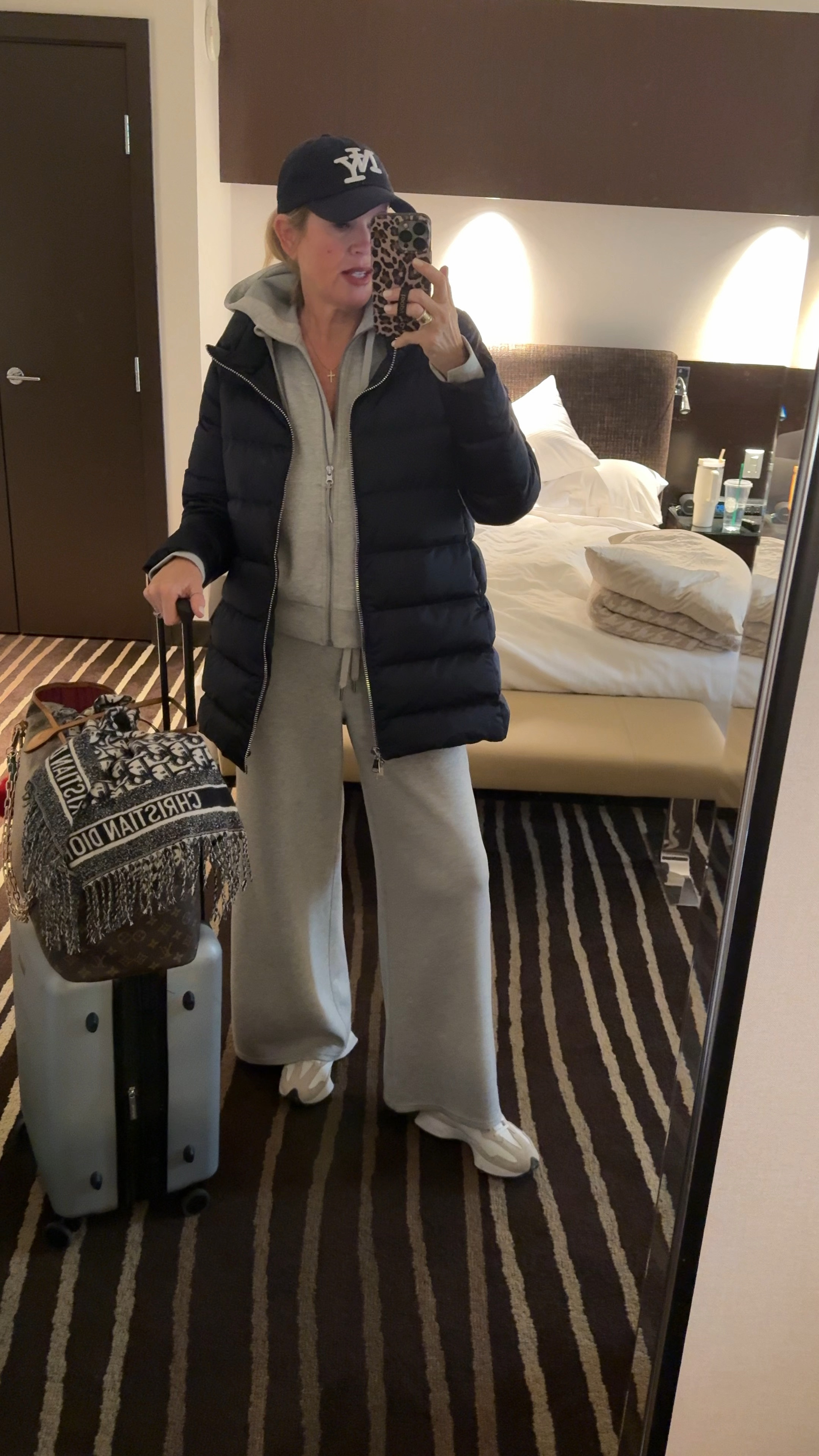 🚨promo codes 
Travel #ootd travel outfit inspo

Cotes of London puffer coat in navy!
Lightweight yet really warm!
🚨Save 20% with code DARcY20 

Spanx air essentials wide leg pants with drawstring fit tts Comes
In heather grey 

Spanx zip up air essentials sweatshirt, buttery soft and fits tts 

Navy sports top/  bra tank under neath  tts 

🚨Save 10% with code: DEARDARCYXSPANX 

Navy ny gat 

New balance tennis shoes 

Lv never fun large 
Vera Bradley luggage 



#LTKTravel #LTKWatchNow #LTKFitness
