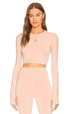 adidas by Stella McCartney Crop Long Sleeve in Ashpea from Revolve.com | Revolve Clothing (Global)