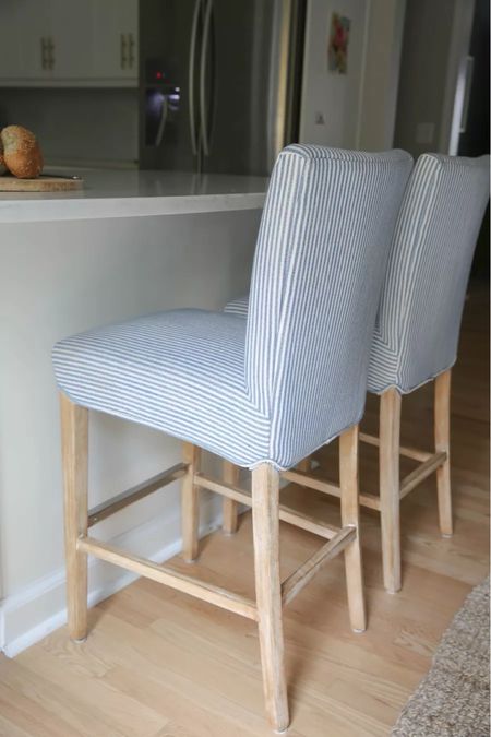 Love my coastal barstools! These striped blue upholstered kitchen counter stools are comfortable and functional. Linked similar options with a coastal modern vibe too! 
5/29

#LTKStyleTip #LTKHome