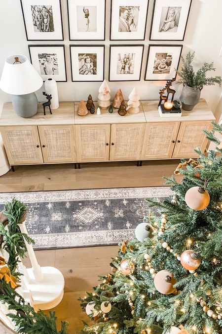 Our entryway console all ready for Christmas 🥰







Christmas decor, Christmas decorating, sideboard styling, console table, storage cabinet, cane furniture, cane, entryway, Christmas tree, neutral Christmas, wooden tree, reindeer, Christmas stems 

#LTKSeasonal #LTKHoliday