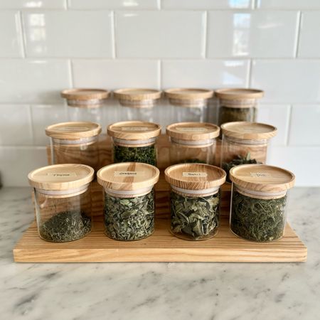 Dried herbs from the garden, stored in these cute jars. 
