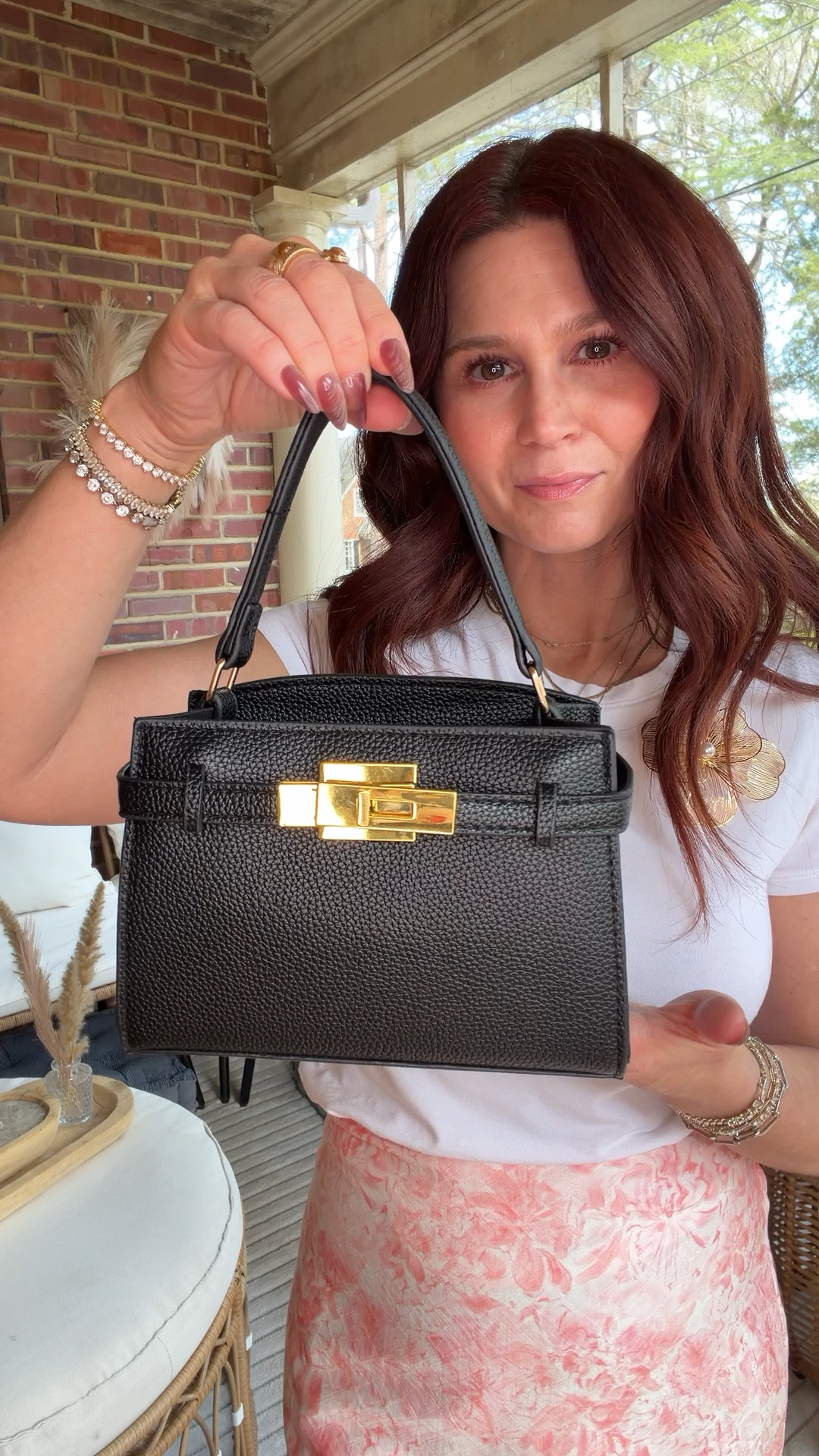 The cutiest mini designer dupe bag. Comes with long strap 