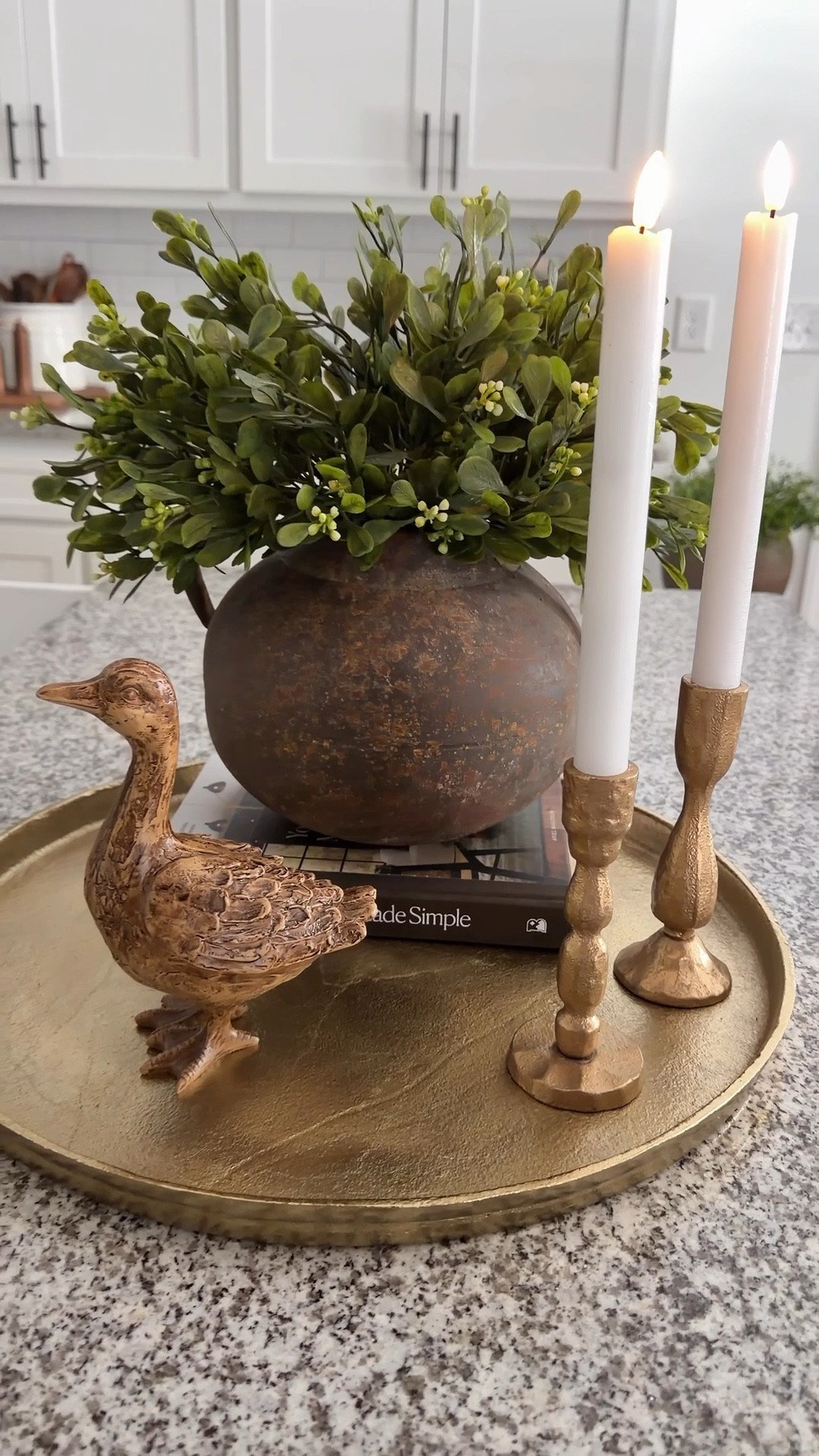 Simple styling for Spring & Summer 🤍
I started with a gold tray to ground everything and give it a warm, layered base. Then I added a beautiful vase with greenery for that fresh, airy feel. A couple of candlesticks bring in a soft glow, and I couldn’t resist finishing it off with the sweetest little duck.

Easy, pretty, and just enough to make the space feel special.