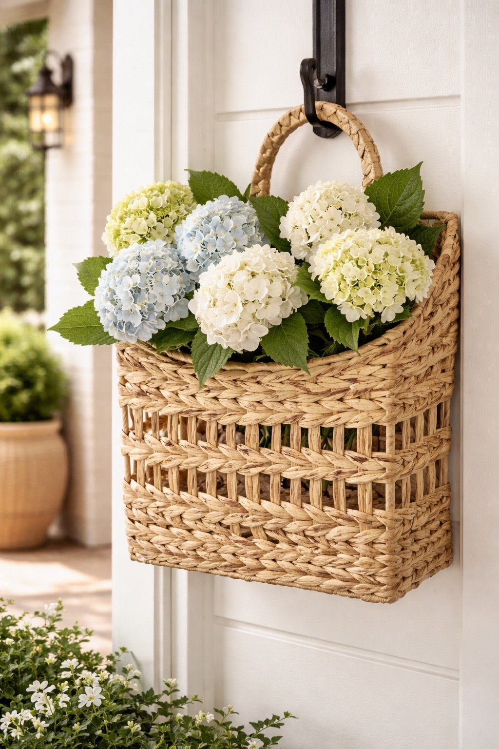 Spring decor idea! Hang florals in a basket on the porch 🤍 

#LTKHome #LTKSaleAlert #LTKSeasonal