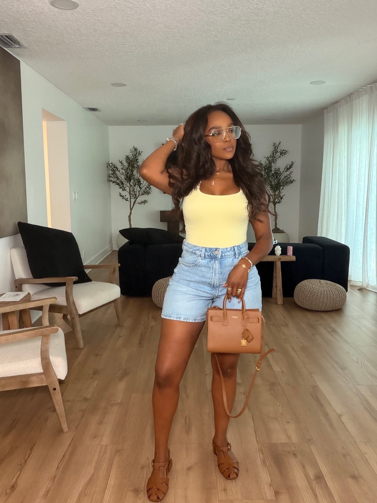 Hi babes!

This is one of those easy summer outfits that always works ☀️ The light wash denim shorts paired with this buttery yellow tank gives such an effortless, clean girl vibe while still looking so put together.

Where to wear this:
Brunch
Errands
Casual summer days
Vacation
Weekend outings

I love outfits like this because every piece can be mixed and matched so many different ways — from the denim shorts to the neutral accessories — making the cost per wear so worth it.

Everything is linked below

xx Kira | Kira’s Fashion Finds

34D - 27 - 40 | size small or 4

#LTKootd #LTKgrwm #LTKvlog