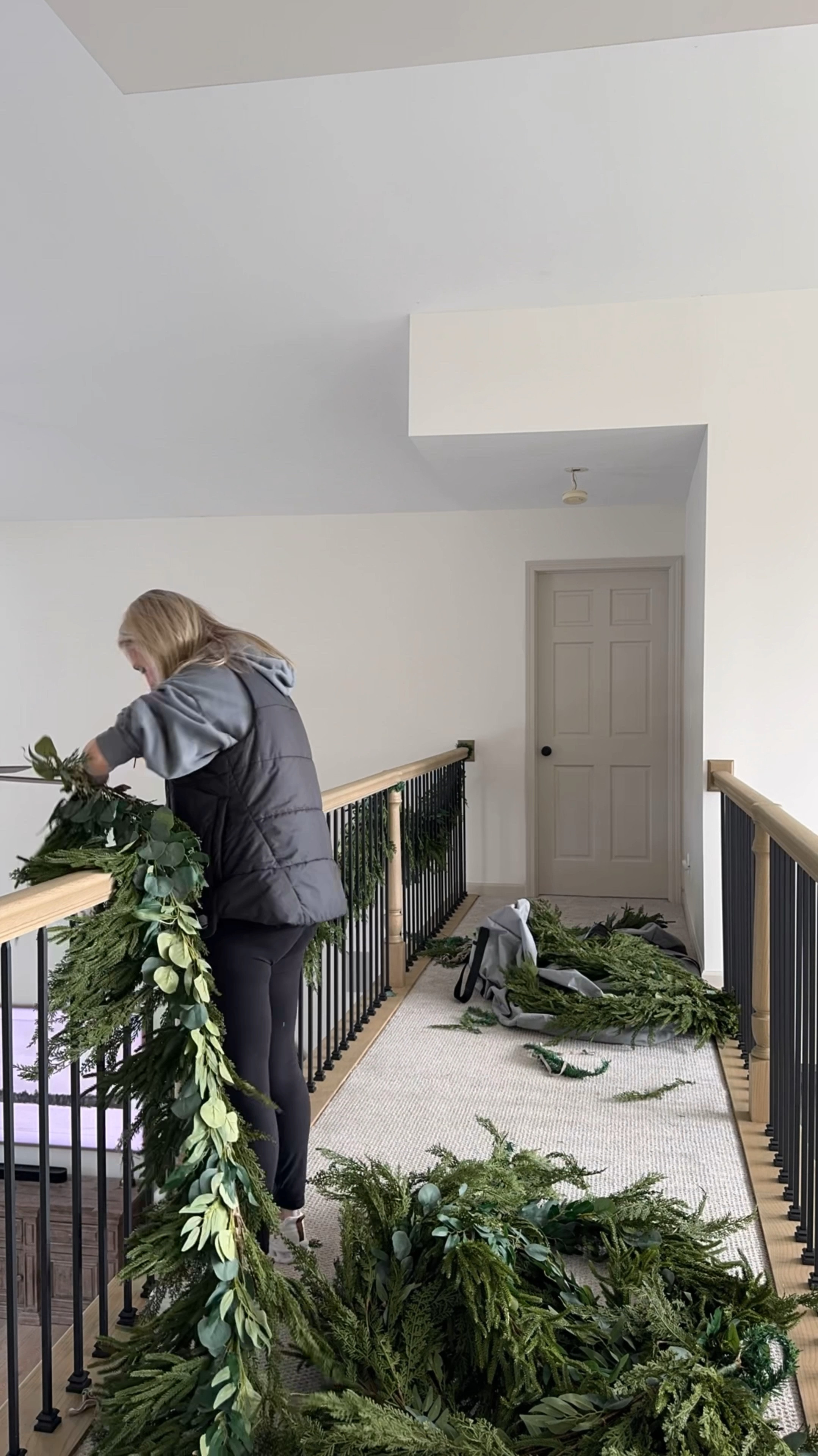 My favorite Christmas garland 😍 I use these cool garland twist ties they blend right in and don’t damage your railings! 

#LTKHoliday #LTKSeasonal