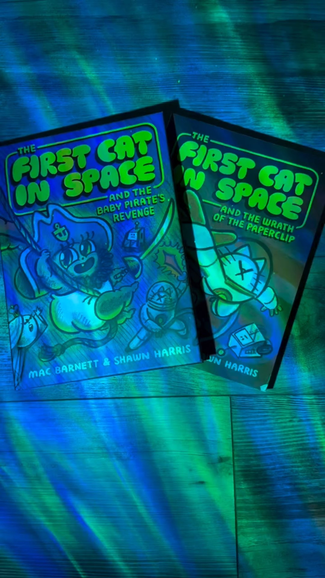 ✨ Book Spotlight ✨
The First Cat in Space and the Wrath of the  Paperclip
The First Cat in Space and the Baby Pirate’s Revenge 
📚 By: Mac Barnett & Shawn Harris 

If you could team up with one unlikely hero to save the world, who would it be — a space cat, a baby pirate, or a talking banana?

Synopsis: 
Wrath of the  Paperclip
“4.5 billion years ago . . . an AI paperclip named CheckMate was designed to fix grammatical errors. Exhausted of correcting “who” vs. “whom,” it concocted a plan to eliminate spelling errors once and for all. All life-forms would be turned into something beautiful, practical, perfect: a paperclip.
Thankfully, it was buried in the debris. Long forgotten . . . until it was accidentally freed. Now CheckMate has invaded every computer on Earth and is bent on fulfilling its dastardly plot. There’s only one trio who can save the day: the First Cat in Space, the Moon Queen, and LOZ 4000. But when CheckMate zoops First Cat’s spacesuit, our titular hero is now powerless. The fate of the world depends on…a regular little kitty cat.
Will everyone in the universe become school supplies?!

 Baby Pirate’s Revenge 
“After Captain Babybeard steals a treasure map from the Queen of the Moon, the notorious pirate sees nothing but piles of gold in his future. But a mutiny, led by his first mate, the Martian Pirate James Plantain, leaves Babybeard marooned on a deserted island. Betrayed by his crew, the little captain seeks an unlikely alliance…
Will Captain Babybeard get revenge? Will First Cat, the Moon Queen, and LOZ 4000 recover their treasure map? Or will the moon fall into the hands of a nefarious banana?”

Thanks @tlcbooktours and @harperalley for the #gifted copies! 

@macbarnett @shawnharri5 #TheFirstCatinSpace #graphicnovel #firstcatinspace #kidsgraphicnovel #MacBarnett #ShawnHarris #BookSpotlight #TheFirstCatInSpace #KidsGraphicNovel #GraphicNovelLove #MacBarnett #ShawnHarris #MiddleGradeReads #Bookstagram #TLCBookTours #HarperAlley #BookishFun #ReadersOfInstagram #BookLovers #BookRec #BookishCommunity #GiftedBooks