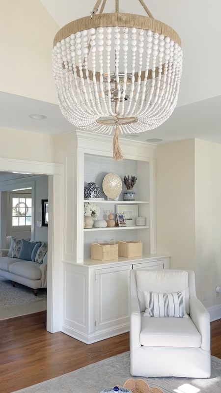 This gorgeous Serena & Lily chandelier was a major homesense find, but it’s currently on sale here! And linked the Amazon peel & stick faux grass cloth I just used on our family room built ins!! Color is: whisper blue and is a beginner friendly project! 🙌🏻 Plus I just found swivel chairs that are so similar to the discontinued ones we have 🤍

Wall color: BM white down

#LTKhome #LTKVideo #LTKSpringSale