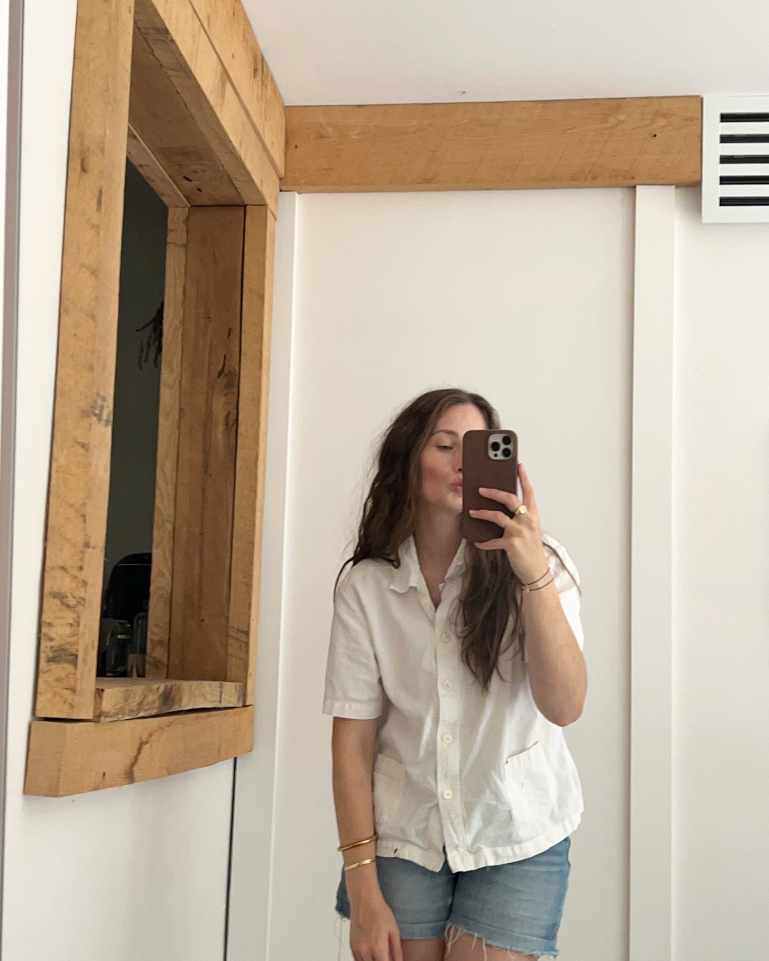 Literally my go-to effortless outfit with a simple boxy button-down that I thrifted and my cut-off denim shorts. I always invest in denim and then mix and match tops that I thrifted to balance the quality of the overall outfit.  

 #LTKStyleTip