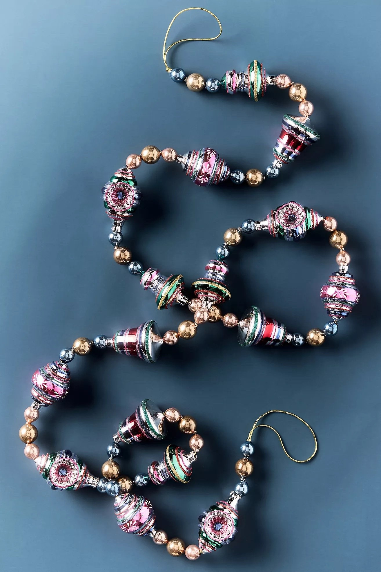 Vintage Shiny Bright Garland

This garland is hand-strung with colorful glass beads and miniature reflector-style ornaments. It provides a festive finishing touch to mantels, trees, or tabletops

#LTKSeasonal #LTKHome #LTKmomlife