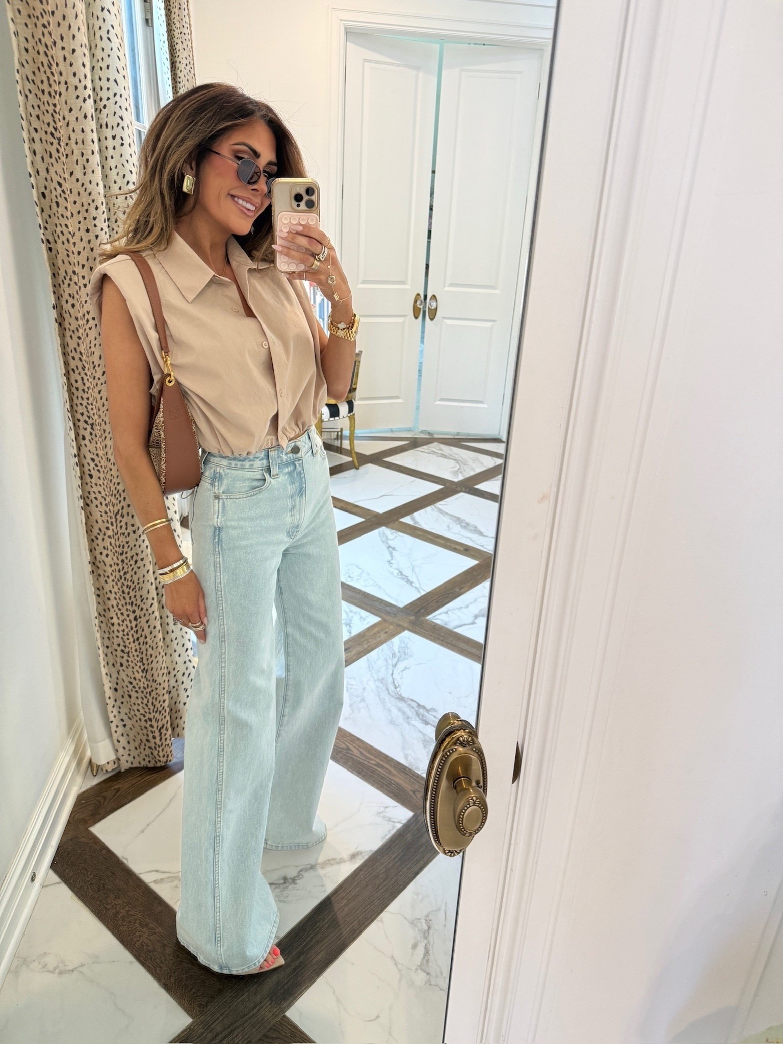 This Amazon top is always a best sellers! I’m wearing 26 in the jeans & small in the top.

Spring outfits, Spring fashion, Date Night outfits, Vacation outfits, Work outfits, Business casual, Spring outfits 2026, Shoulder Pads, Amazon top, Amazon vest, Emily Ann Gemma

#LTKmomlife #LTKSeasonal #LTKootd