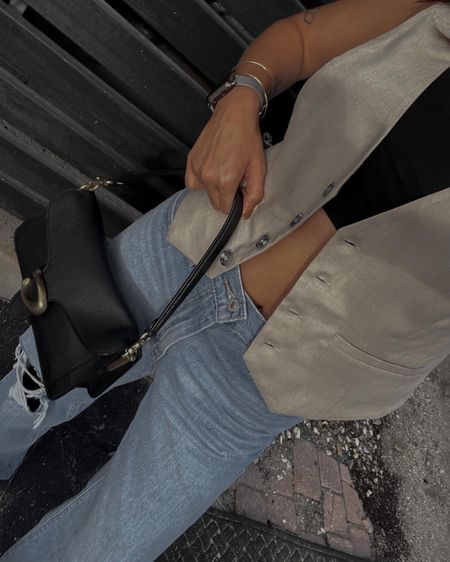 Urban outfitters button vest, vintage vest with Levi vintage jeans

#LTKSeasonal #LTKstyletip #LTKunder50