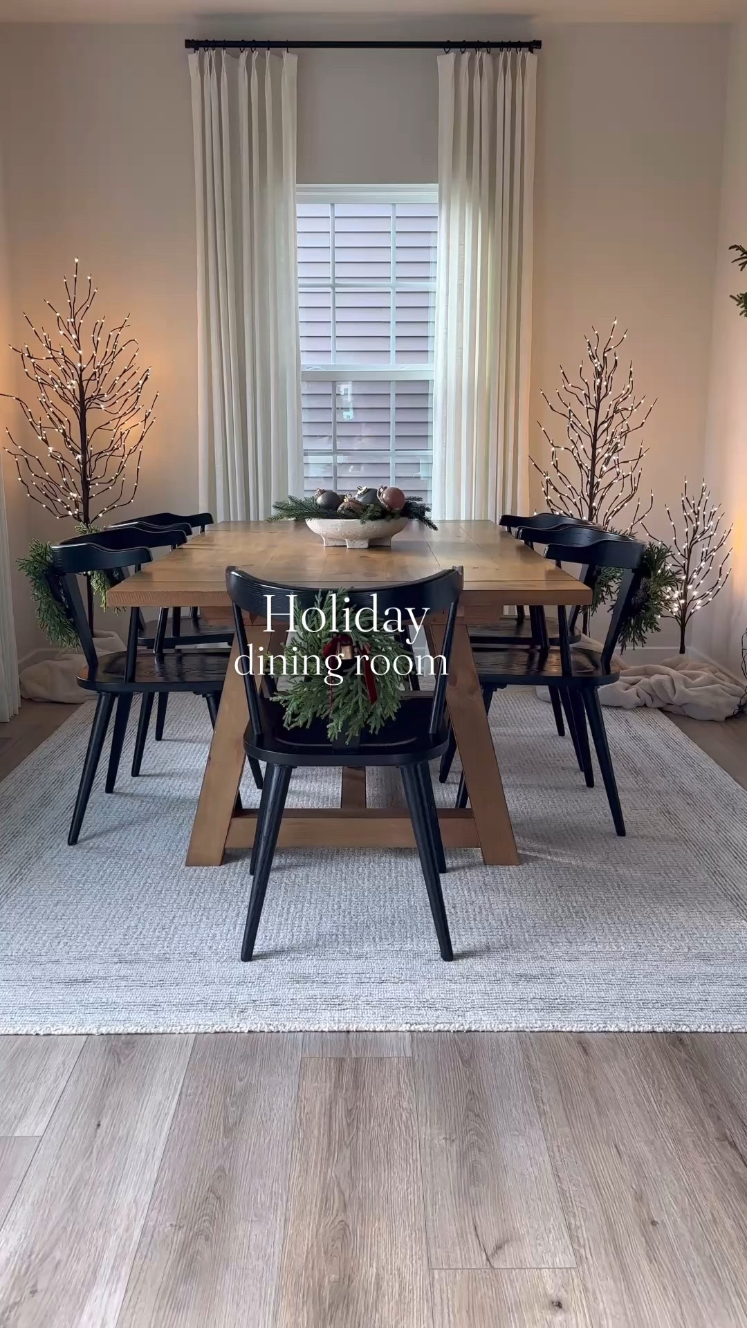 Cozy holiday dining room! Love the warmth these twinkle trees add to the space. 
#diningroom #holidaydecor #christmasdecor #twinkletrees 

#LTKSeasonal #LTKHome #LTKHoliday