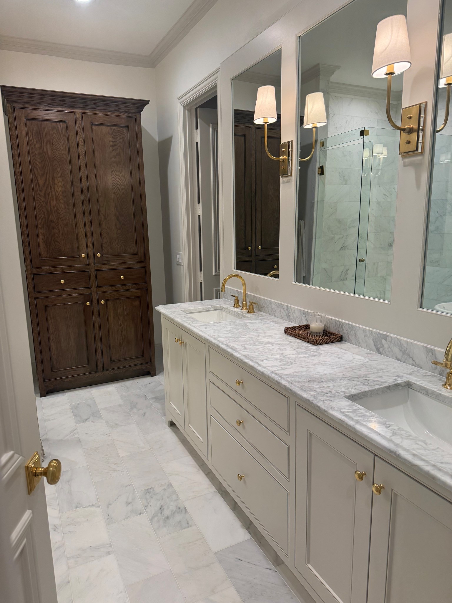 Trim/cabinets/doors - Benjamin Moore Fog Mist 
Walls - Swiss coffee at 75% 
Stain - dark walnut 

#LTKHome