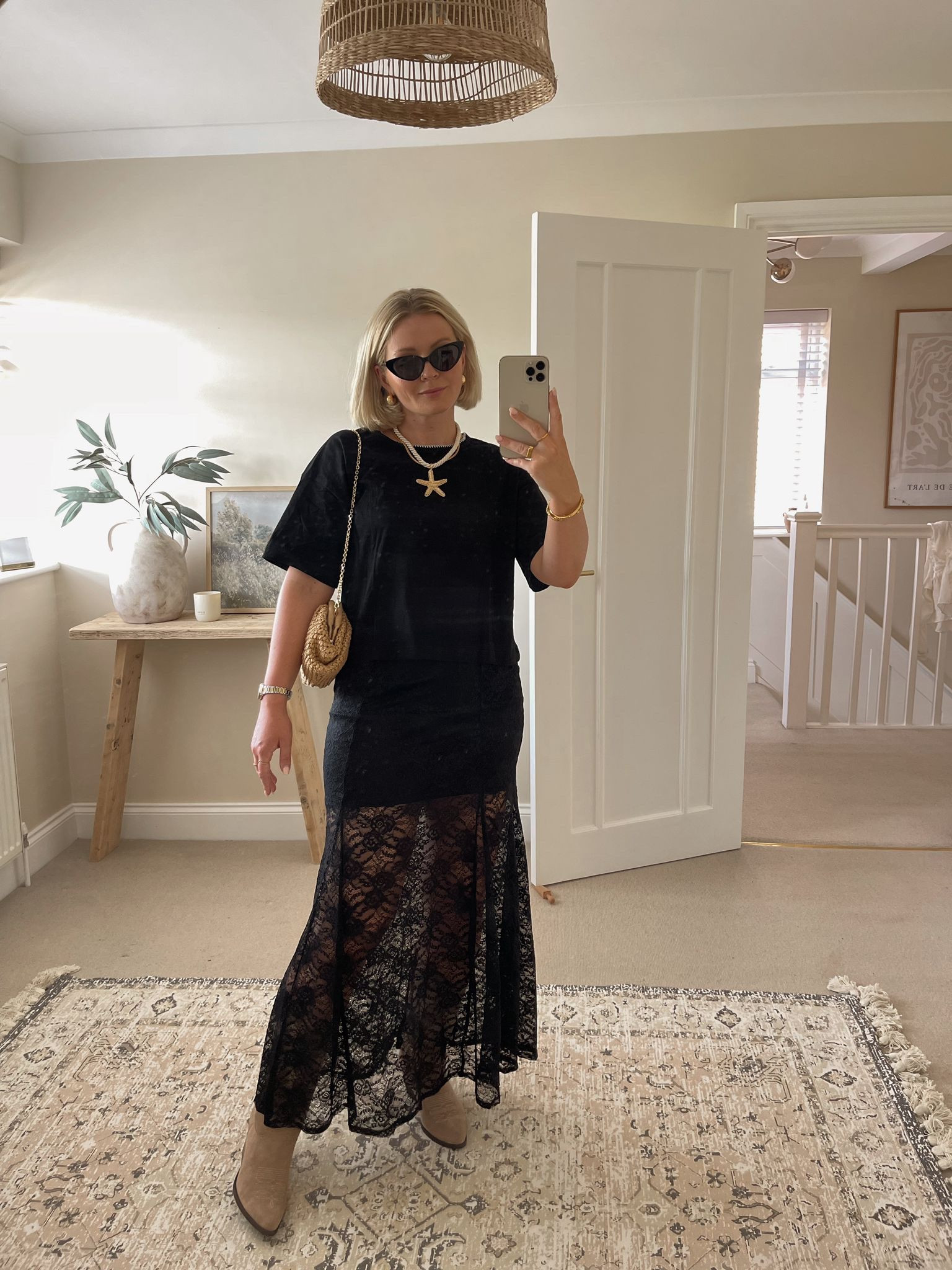 Chic summer festival & Ibiza outfit ideas - black lace maxi skirt & t-shirt from river island, beige suede cowboy boots, starfish necklace, mantra tortoiseshell sunglasses & mango raffia clutch bag

#LTKsummer #LTKuk #LTKstyletip