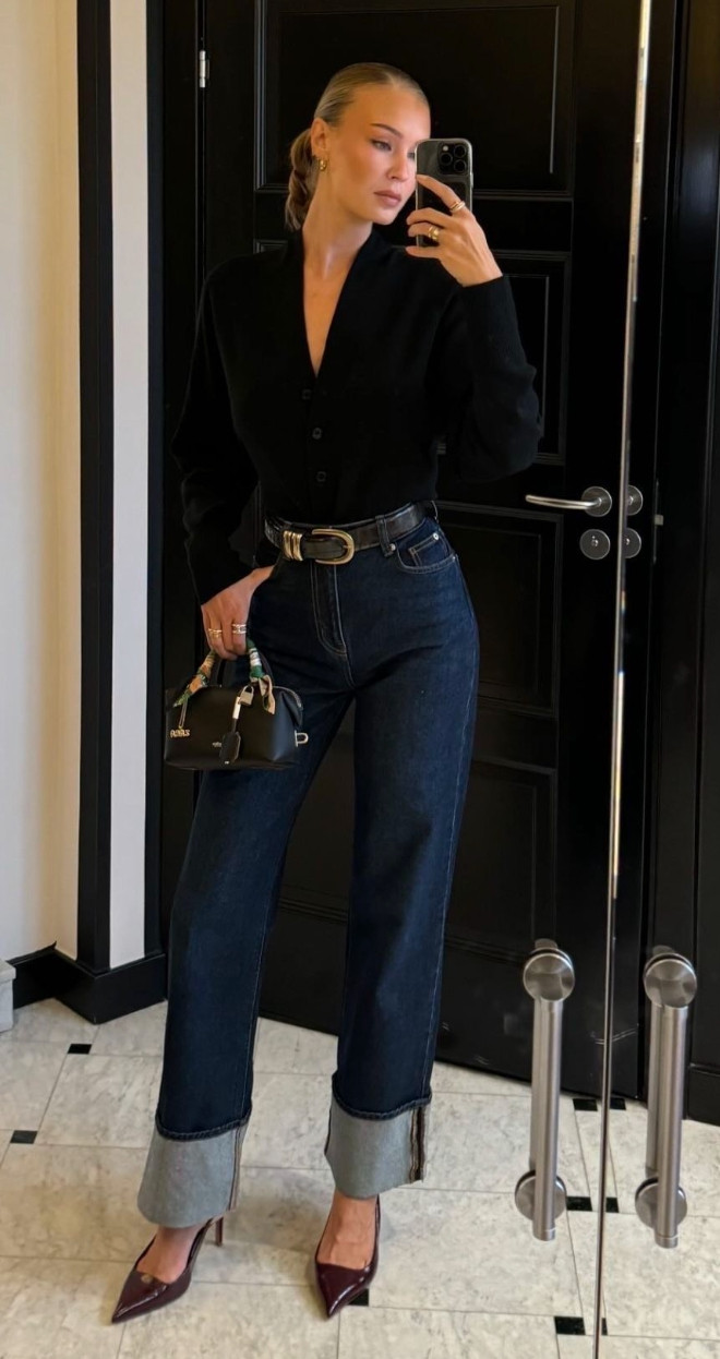 This elevated denim outfit pairs dark cuffed jeans with a sleek black blouse and pointed heels for a polished, sophisticated everyday look.
A statement belt and structured mini bag add refined details that instantly make a simple jeans outfit feel chic and put together.  

 #LTKdayinmylife #LTKootd