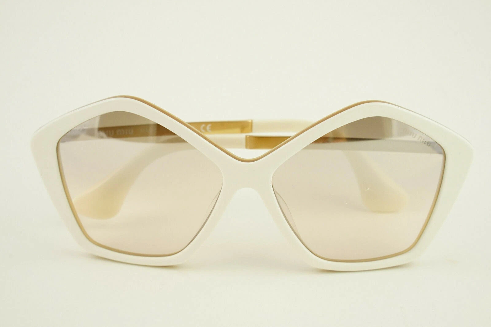 MIU MIU SMU 11N 57-14 White Gold KAT-1J1 135 1N Sunglasses | eBay US