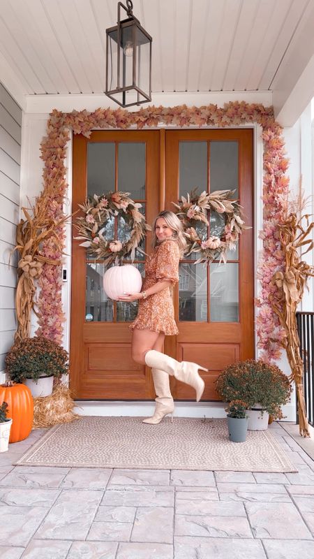 front porch fall decor
leaf garland from oriental trading company
custom wreath made by ruthie (my mom)
fall dress from apricot lane boutique va beach (dm them on IG to order)
schutz maryanna boots
Mums decor
Front porch decor
Double front door
Fall decor


#LTKhome #LTKunder100 #LTKunder50