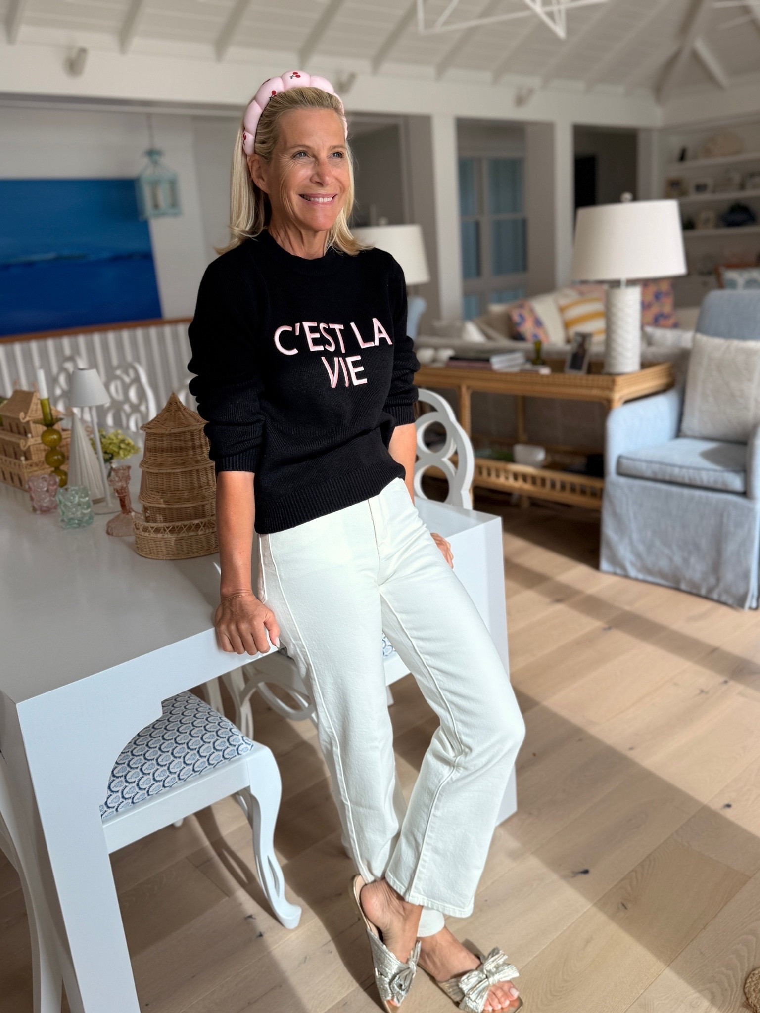 Black Sweater and White Jeans Outfit Idea.

#LTKootd #LTKOver40 #LTKSaleAlert