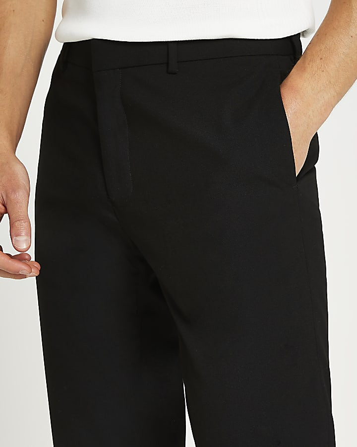 Black slim fit suit trousers | River Island (UK & IE)