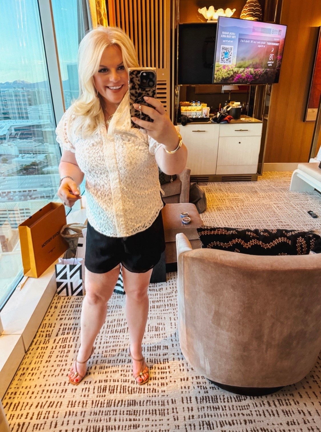 My only regret about this top is that I didn't find it until June last year.
It's back this year and available now. It's easily one of the more versatile pieces that I own. It looks adorable with dark wash jeans for a relaxed look. I wear it with black wide leg pants for the office. I wear it with a cute skirt or dress shorts like here for a date night outfit.

Easter outfits, date night outfits, spring outfits, work outfits 

#LTKSeasonal #LTKOver40 #LTKWorkwear