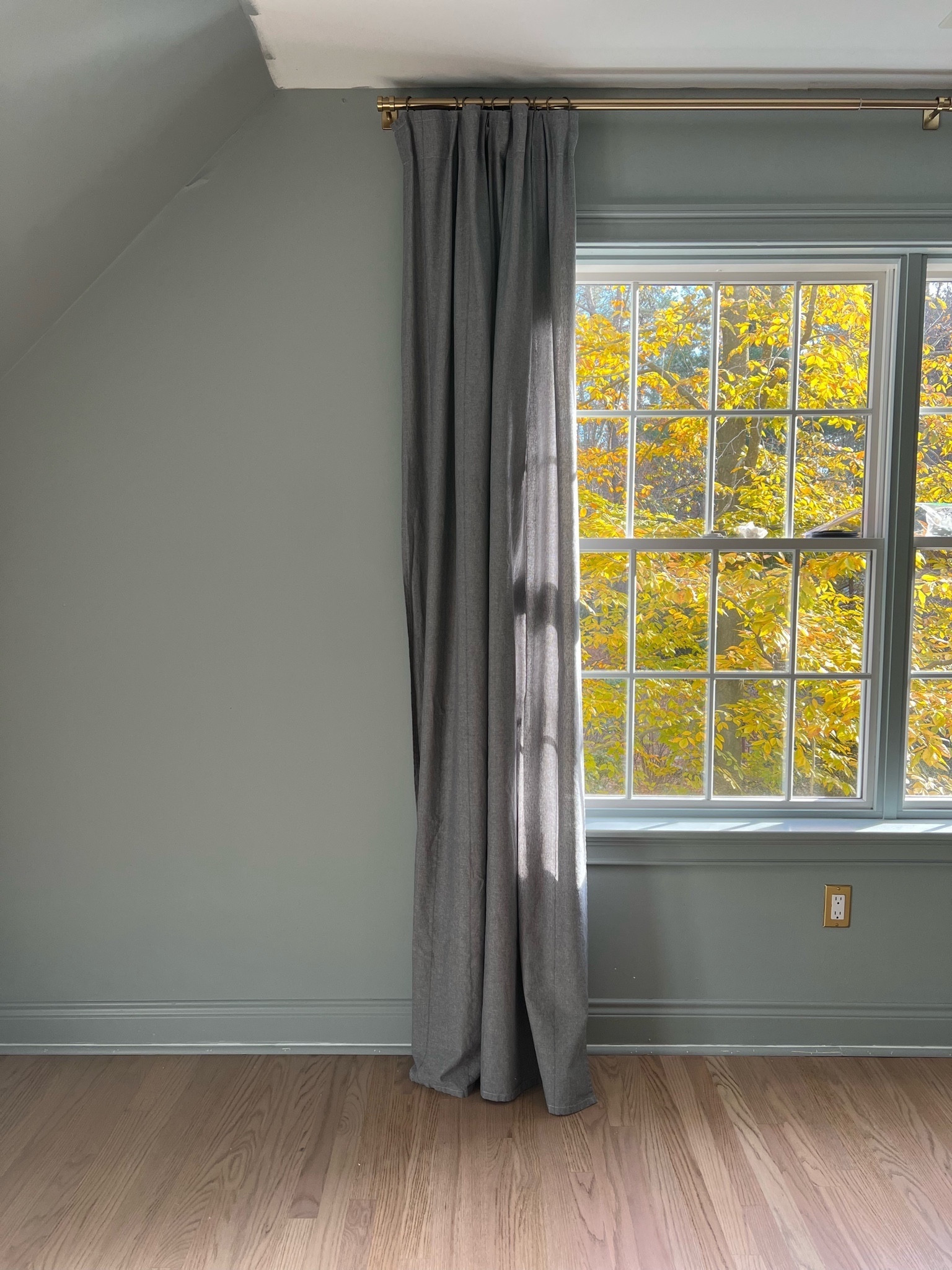 Guest bedroom painted booth bay gray by Benjamin Moore. Paired with these beautiful blue gray curtains from IKEA. The brass rod and brass outlet plates are stunning! 

#LTKhome #LTKHoliday #LTKsalealert