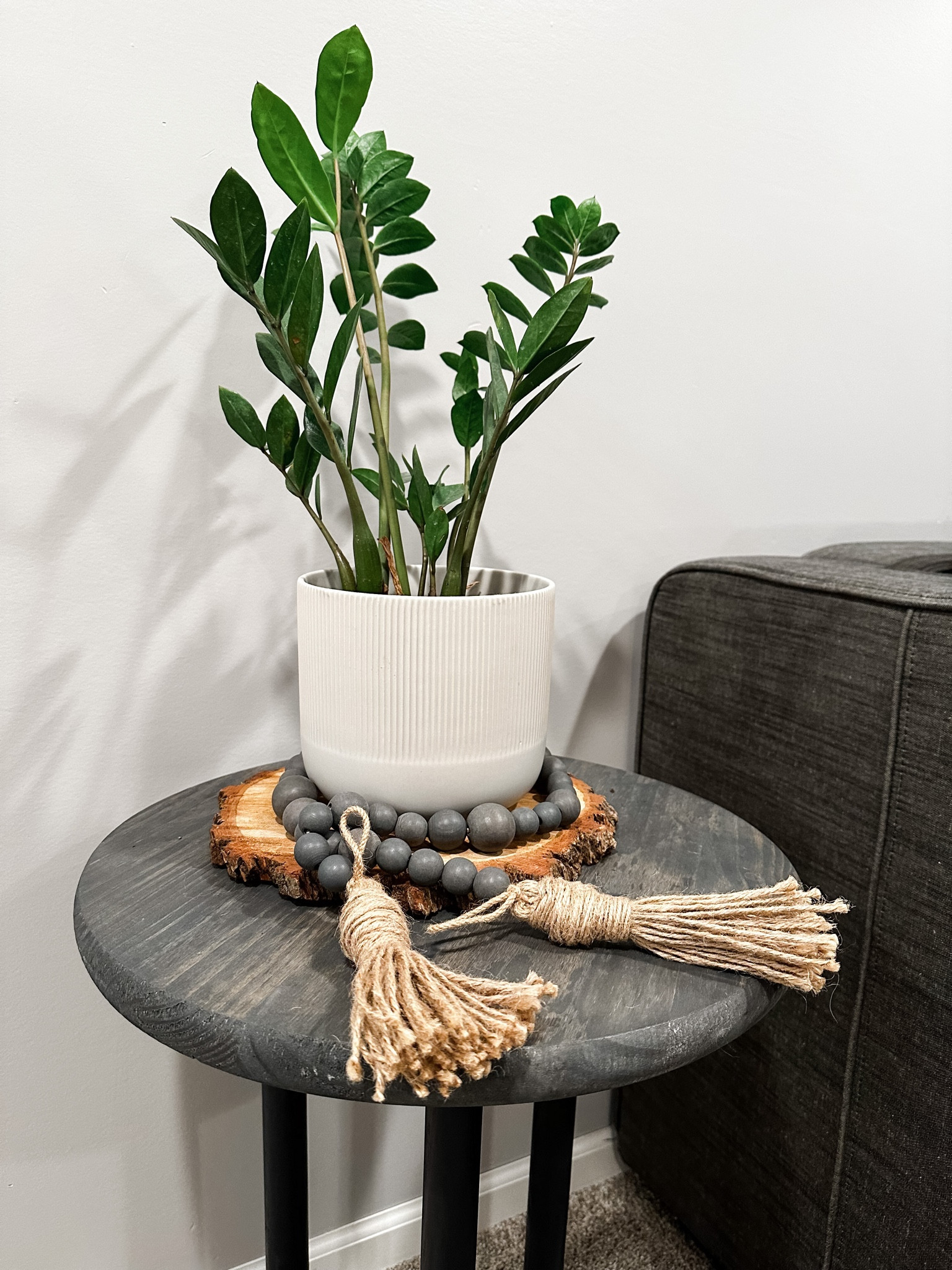 Layers of style in one small space! 
I love this little vignette …

Small end table
Low maintenance plant 
Textured plant pot
Slim cut of live edge wood
Beads!

❤️
#livingroom #livingroomdecor #livingroomstyle #stylingmyhome
#homedecor #myhome #inmyhome #interiors

#LTKstyletip #LTKhome #LTKunder50