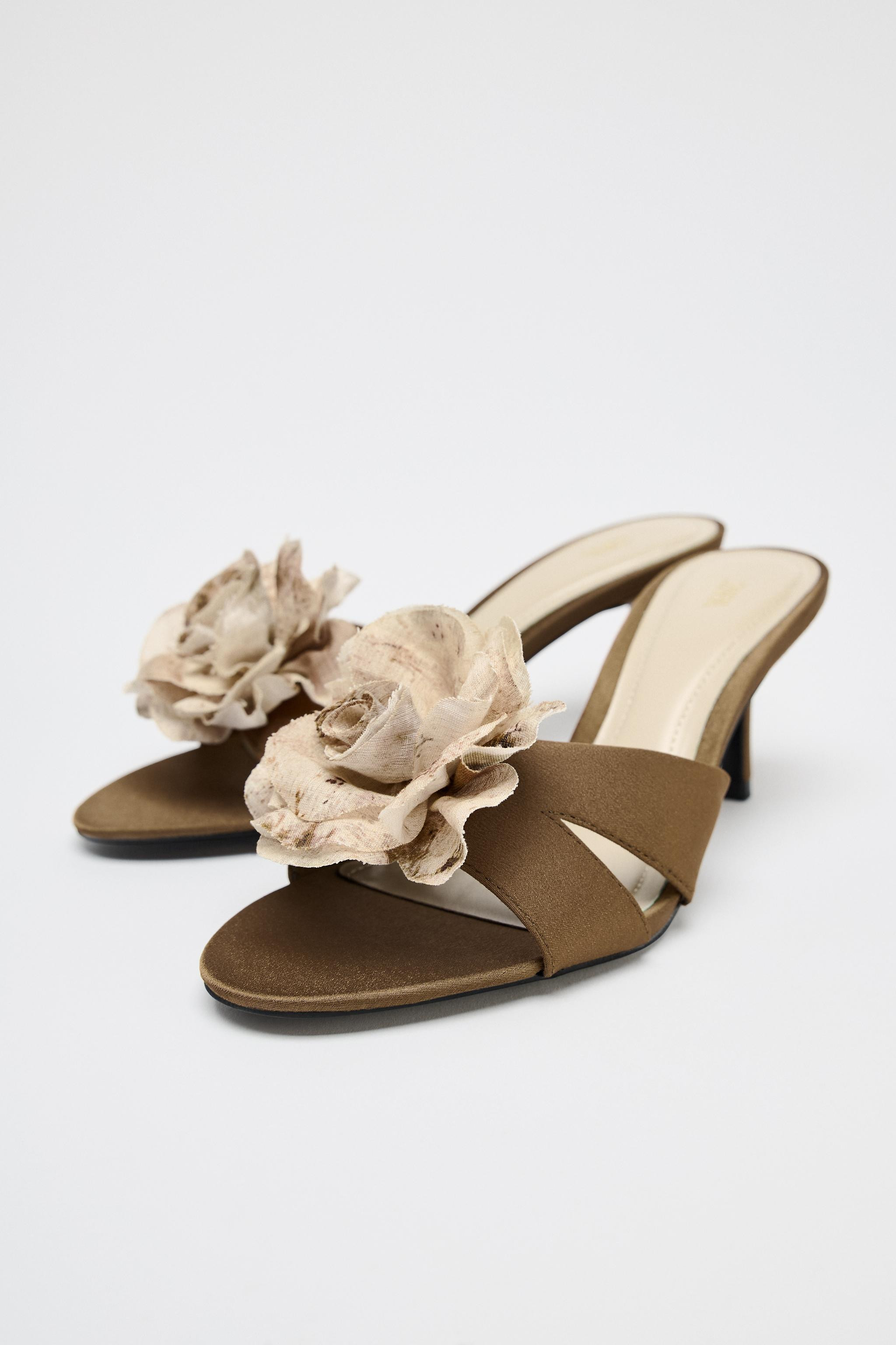 Heeled mule sandals. Strap detail with maxi flower on the front. High stiletto heel. Pointed toe.... | Zara US