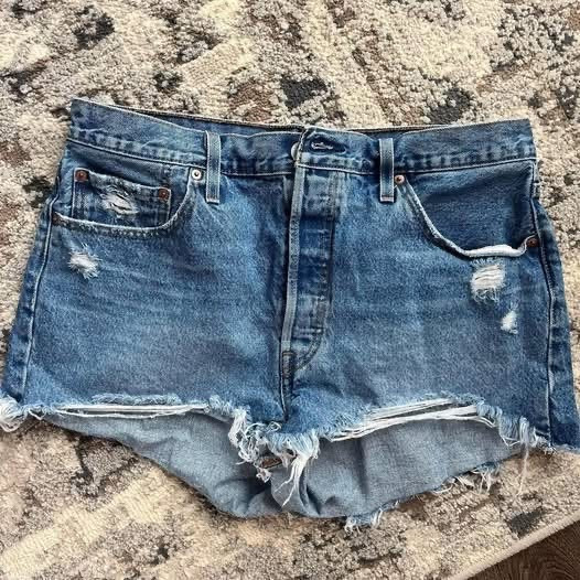 Levi’s 501 Jean shorts are the best. I always grab them on Amazon for the best price. I also size up 1 for the best comfort 