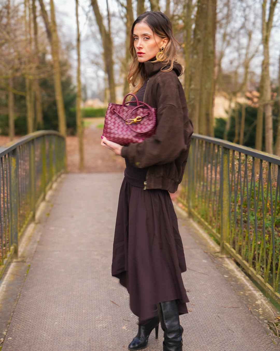 Chocolate midi dress + soft suede bomber for a chic winter walk. Finished with knee-high boots and a burgundy Bottega Veneta weave for that rich-tones moment.

chocolate brown midi dress, brown suede bomber jacket, black knee-high boots, burgundy Bottega Veneta woven bag, tonal winter outfit, quiet luxury, Paris street style, gold statement earrings, rich neutrals, capsule wardrobe

#LTKSeasonal #ChocolateBrown #ParisStyle #BurgundyBag

#LTKwinter #LTKfrance #LTKstyletip