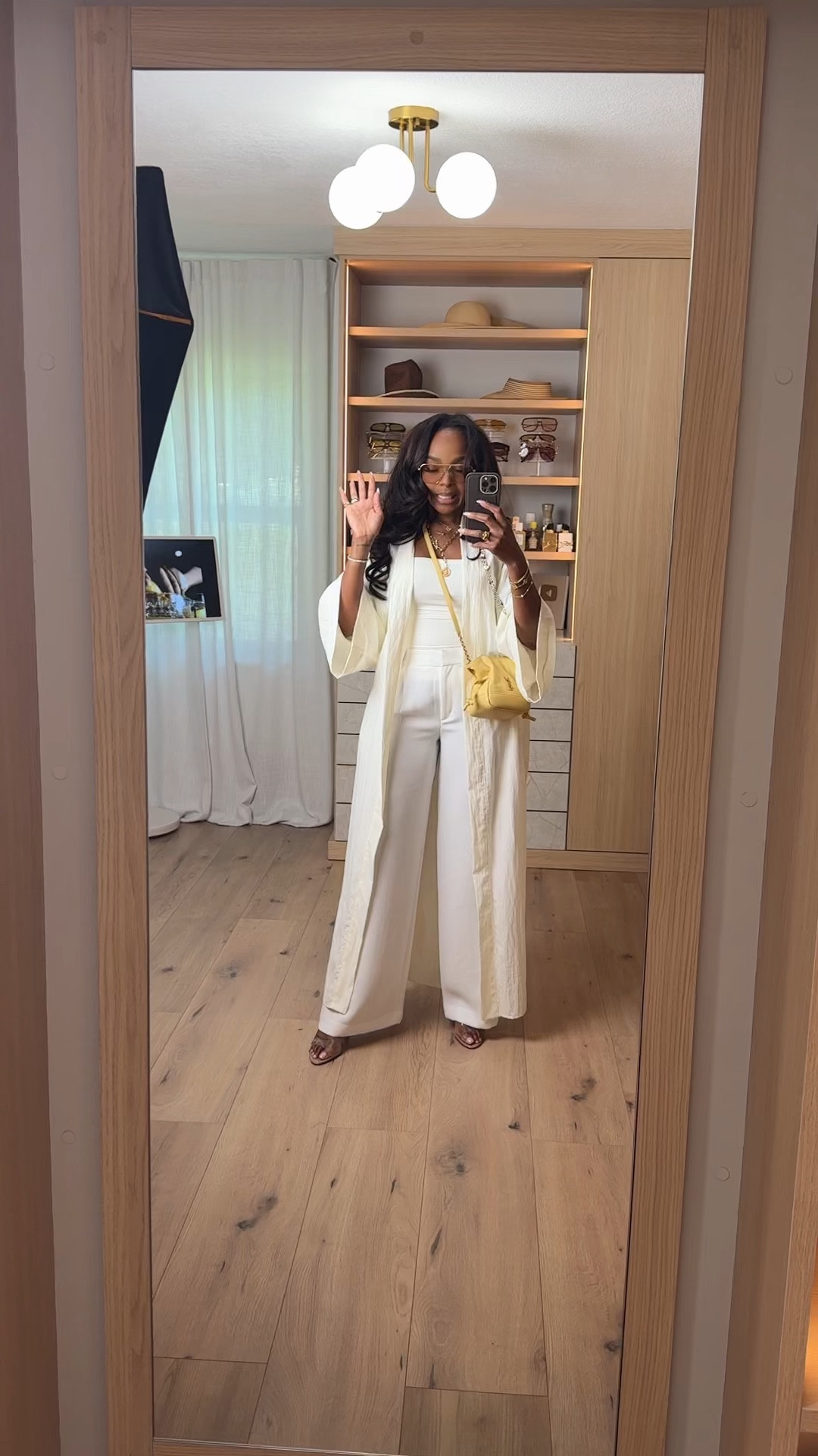 Scroll to shop this chic neutral layered look 🤍

Flowy wide-leg pants paired with a sleek base and a lightweight duster creates that effortless, elevated vibe. Perfect for layering and re-styling different ways, making it a timeless piece you’ll keep reaching for—keeping your cost per wear low.

Perfect for travel, brunch, casual luxe moments, and day-to-night looks.

📏 Measurements: 5’4”, 140 lbs, 34D bust, 27” waist, 40” hips

Follow me on Instagram and YouTube @kirasfashionfinds