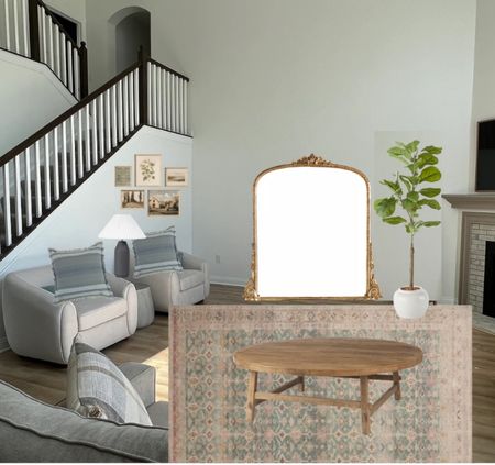 Answering design questions from Club Bloom! Join at BLOOMINGNEST.com :) 

Here I suggested a large mirror to fill up the big empty wall! A gallery wall under the stairs and a rug to cozy up the space! 



#LTKhome