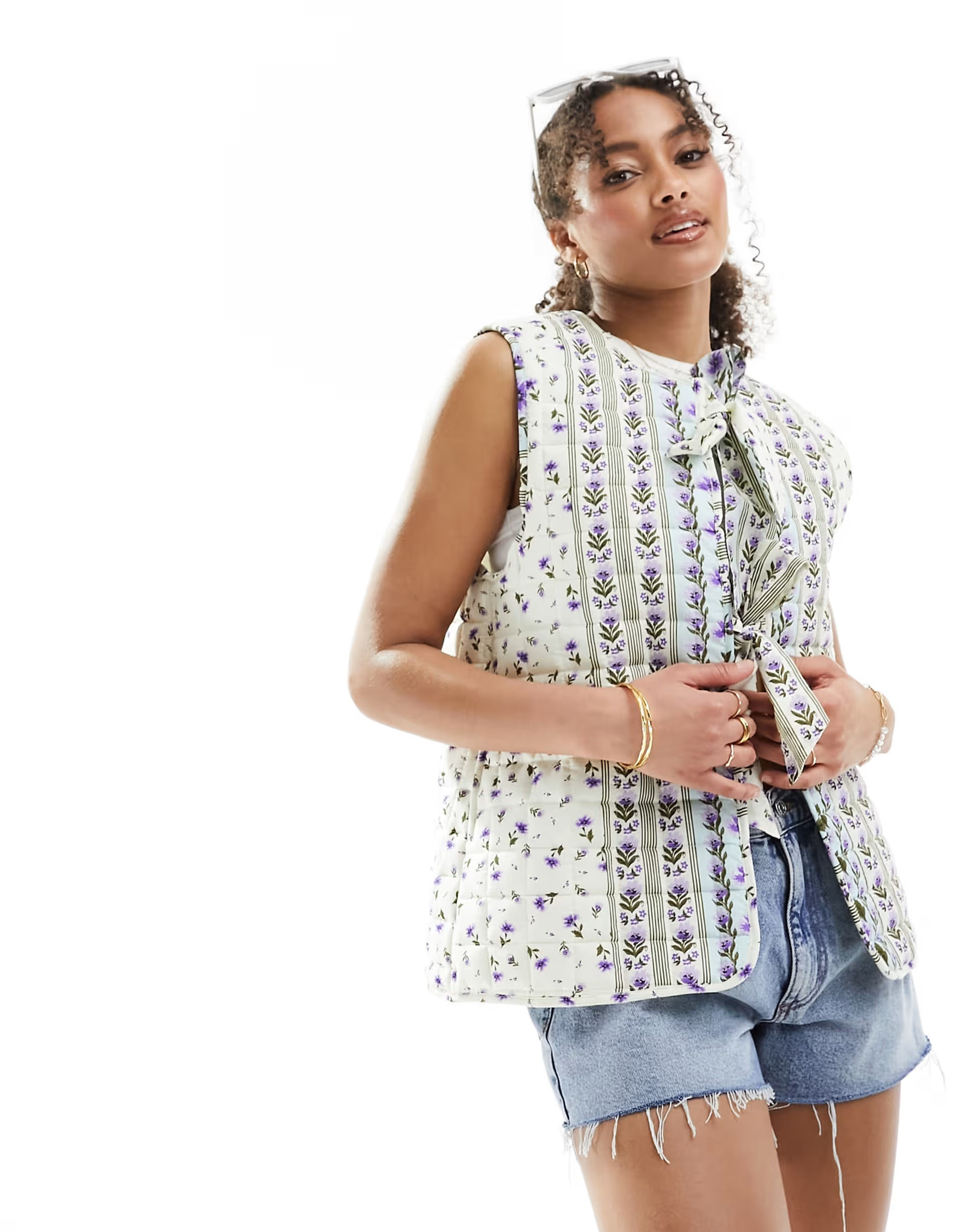 ASOS DESIGN quilted gilet with bows in white | ASOS (Global)