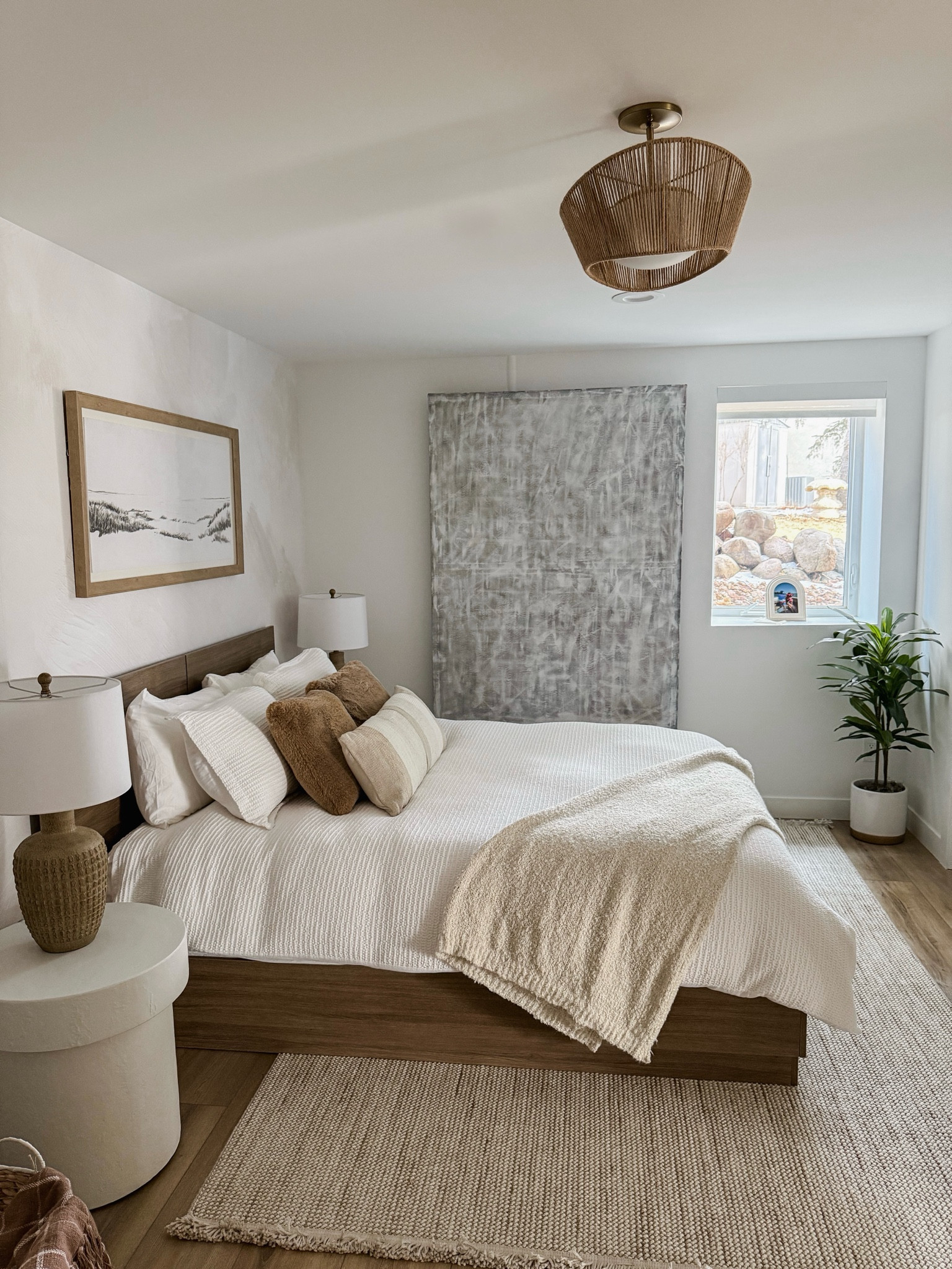 Guest bedroom, neutral home decor. Affordable, light, art, lamp, rug, plant, nightstand, bedding, pillows, sheets, headboard 

#LTKHome #LTKFindsUnder100 #LTKStyleTip