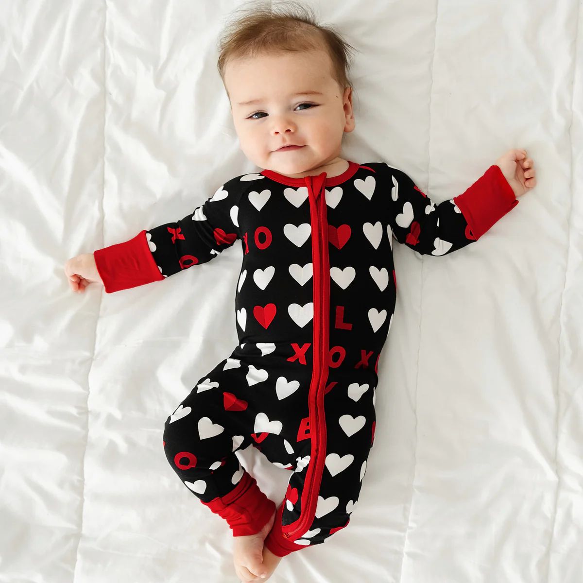 Black XOXO Zippy | Little Sleepies