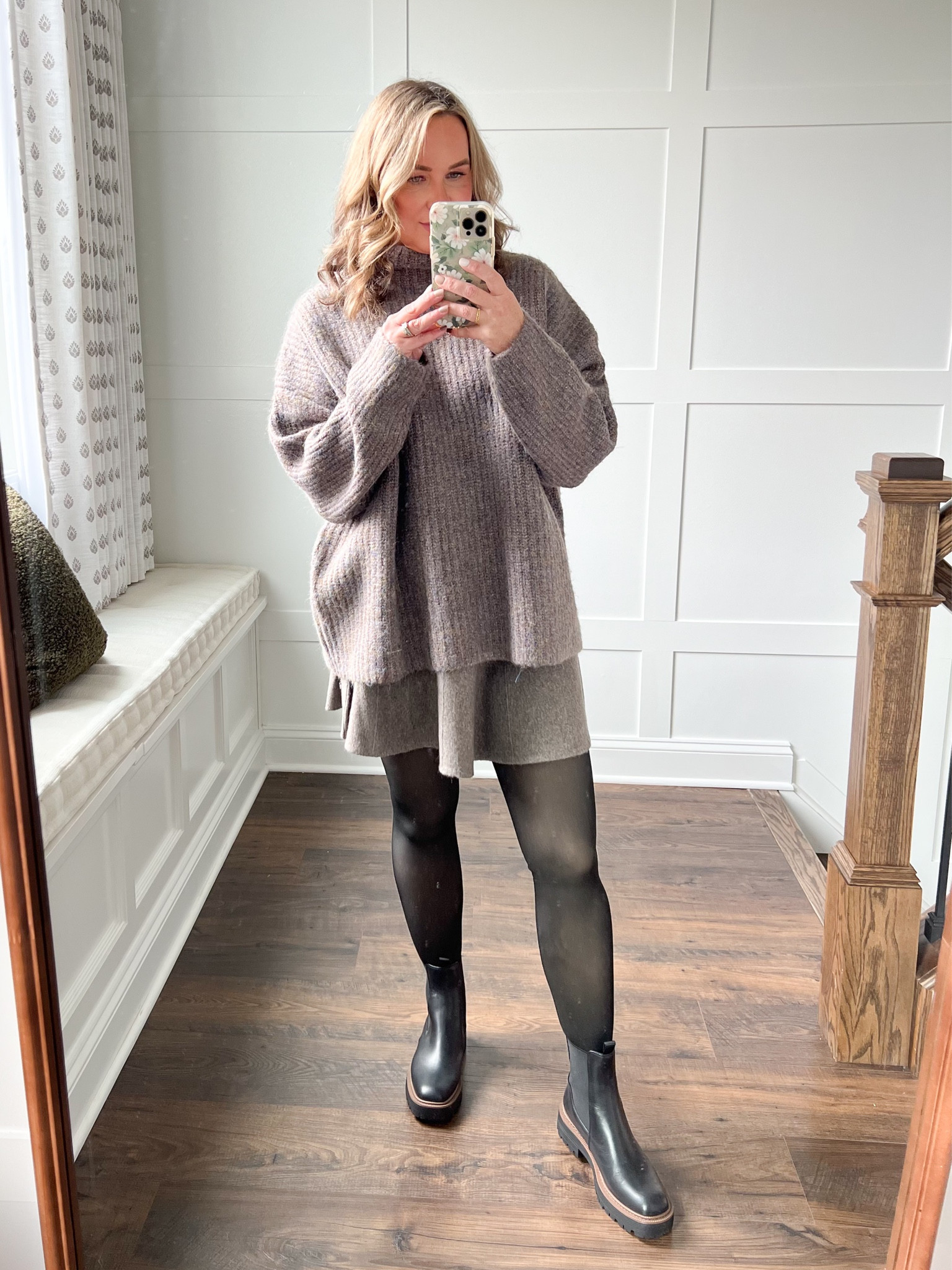 This Free People Cuddle Me Set is such a great find and so comfortable!! Sold as a set (skirt and sweater). I love it so much I also want the blue version. Wearing size medium for reference. My tights are actually fleece-lined from Amazon. Very warm! I wanted these boots last year (they are waterproof) but they were sold out! I was able to get them this year. They have a lug sole which gives a low key cool vibe without being too trendy. You also can’t see in this pic but I’m wearing the cutest rhinestone gingerbread earrings. Linking those too! 

#LTKShoeCrush #LTKStyleTip #LTKOver40