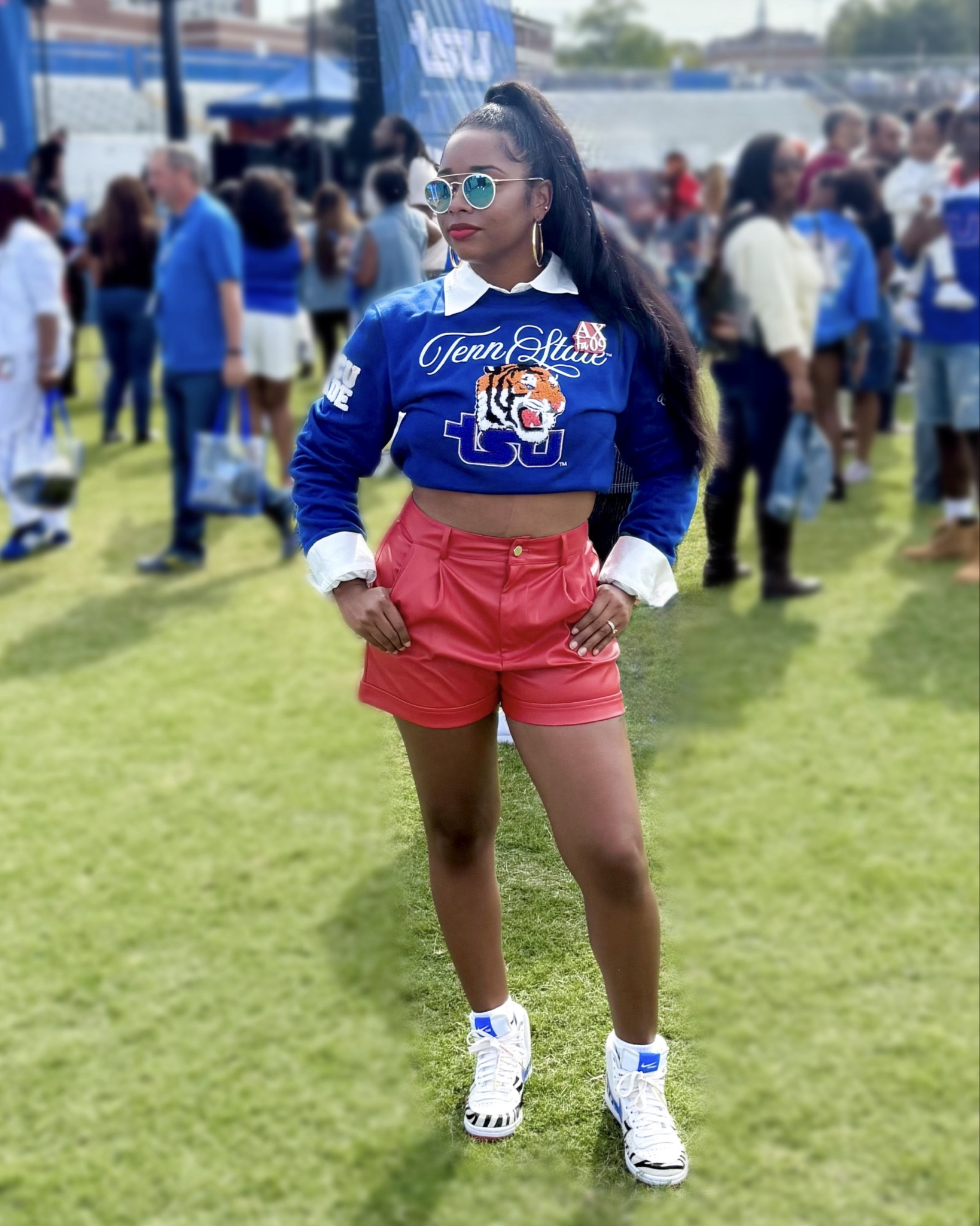 TSU Homecoming!! HBCU Made! 

Blue varsity crop sweatshirt, white button down, red patent leather shorts, Nike High Top Sneakers



#LTKStyleTip