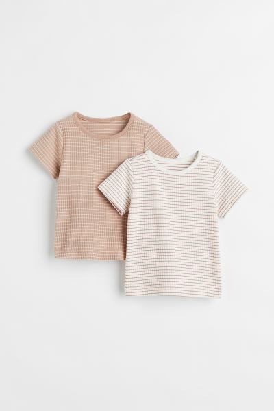 Baby Exclusive. T-shirts in soft, organic cotton jersey with concealed snap fastener on one shoul... | H&M (US + CA)