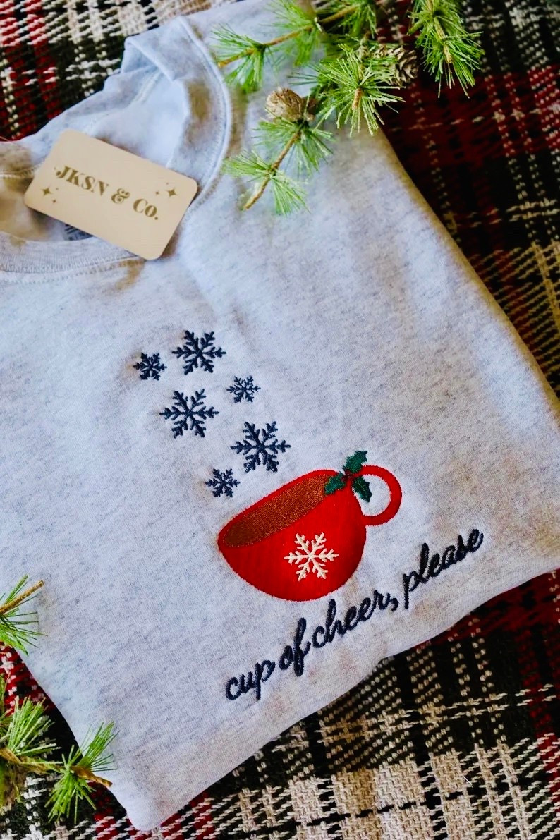 Cup of Cheer, Please - Embroidered Crewneck, Christmas Sweatshirt, Holiday Sweatshirt, Holly Jolly Christmas Inspired, Etsy Christmas Shirt. On sale till the end of the year. 

#LTKSeasonal #LTKGiftGuide #LTKHoliday