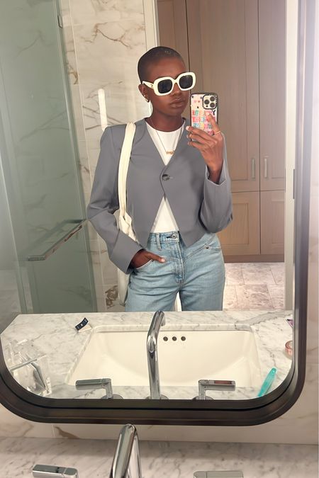 Grey cropped blazer, white seamless tee, light denim jeans with yoke detail and white square oversized sunglasses with retro grey and white new balance sneakers  

#LTKfindsunder100 #LTKstyletip