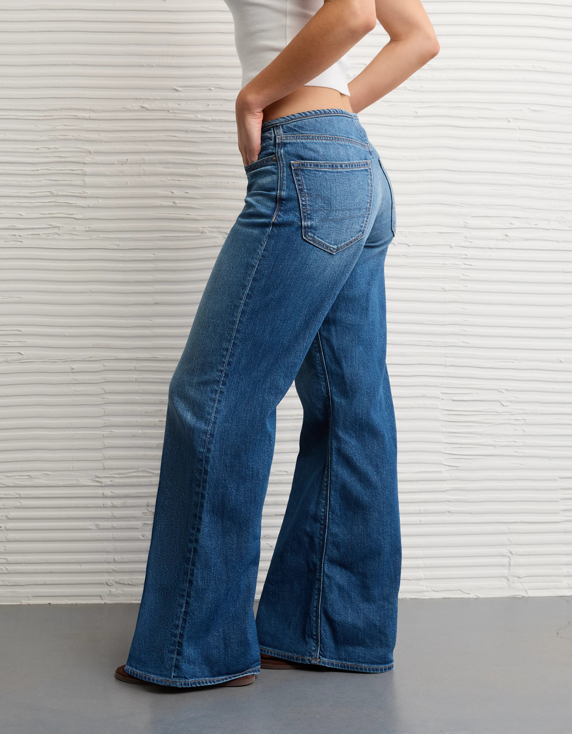 AE Dreamy Drape Stretch Super Low-Rise Baggy Flare Jean | American Eagle Outfitters (US & CA)