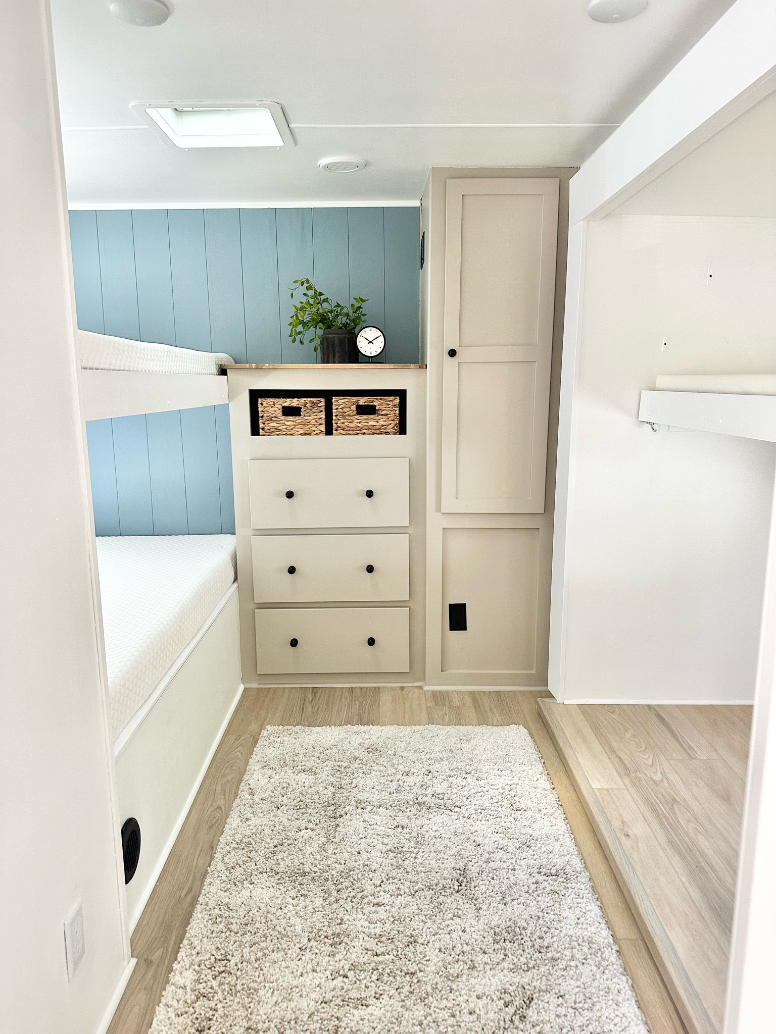 Finished bunk room!
• DIY sharpie shiplap on peel & stick wallpaper.
• Painted cabinets + sealer. (color is solid wood)
• Walls are Sherwin Williams High Reflective White satin.

TRAILER REMODEL 
RV RENOVATION 
BUNK ROOM
CABINET PAINT
WALLPAPER 
RUGS
KIDS ROOM

#LTKFindsUnder50 #LTKHome #LTKFindsUnder100