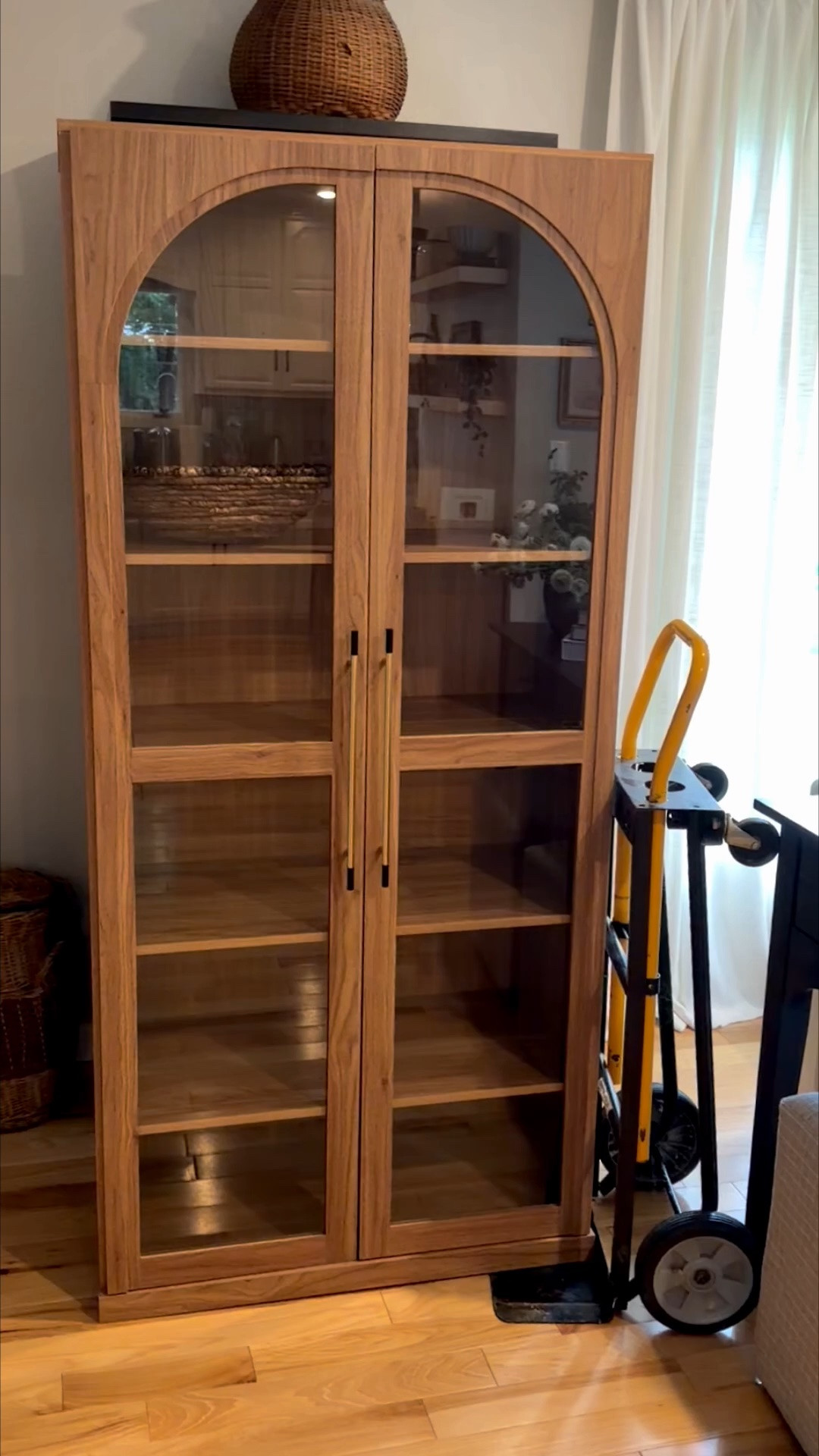 This is such a pretty piece and it was so easy to put together. I can’t wait to style the shelves!

The lighting is making it look orange, but I promise you it is not. If you watch the video, you will see when I get close to it, it is a really pretty brown color. ￼￼

Amazon finds. Bookshelf. Arched cabinet.

#LTKHome #LTKSaleAlert