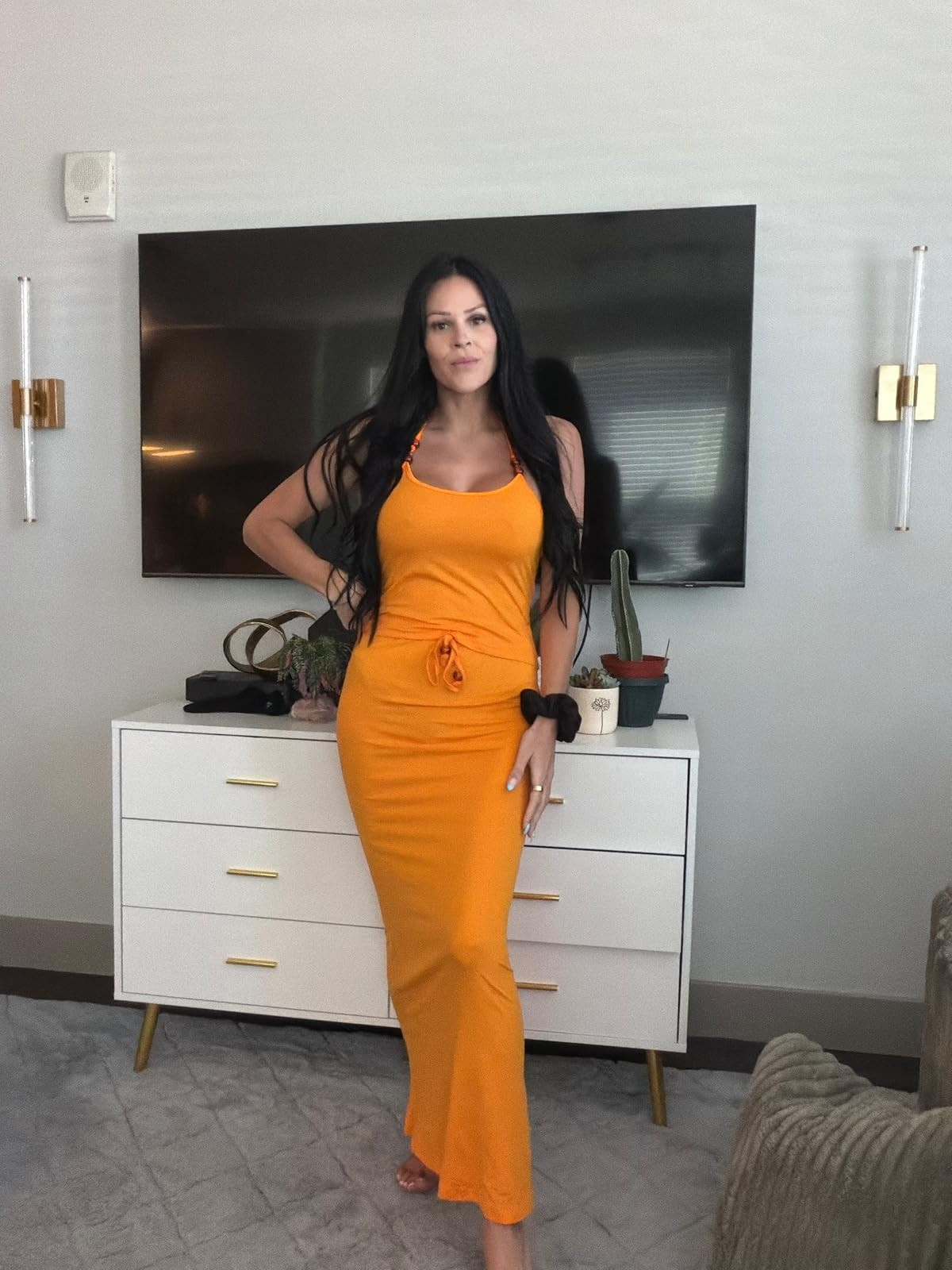 Brighten up your wardrobe with this stunning orange maxi. The perfect blend of comfort and vibrant style for your next getaway. Click the link in bio to shop this look! #maxidress #summerstyle #vacationoutfit 

 #LTKdayinmylife #LTKootd #LTKSaleAlert