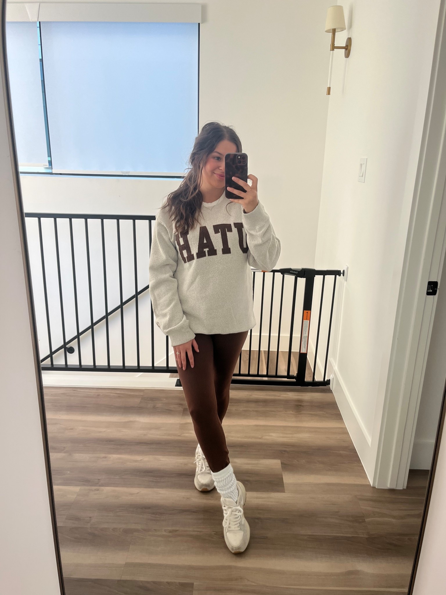 Style tip to make a sweatshirt look cuter is layers! Layer a crewneck under, layer socks, add a puffer! Etc! 

#LTKFindsUnder50 #LTKActive #LTKStyleTip