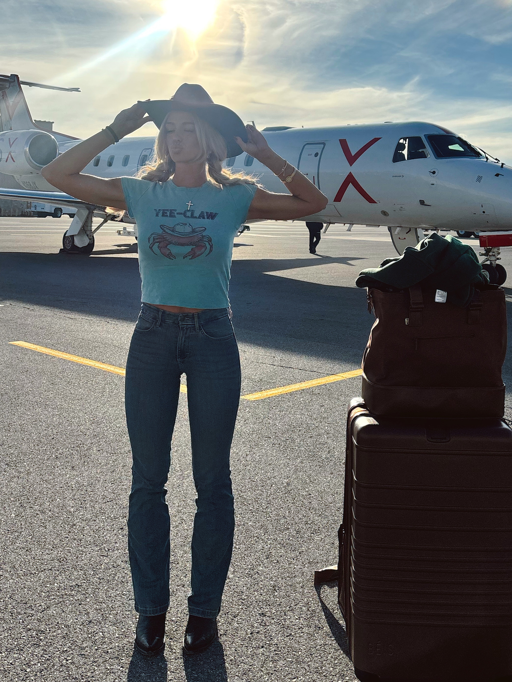 Yee-Claw🦞My exact shirt is from Altar'd State & my jeans are size 25/34 

 #LTKootd #LTKTravel