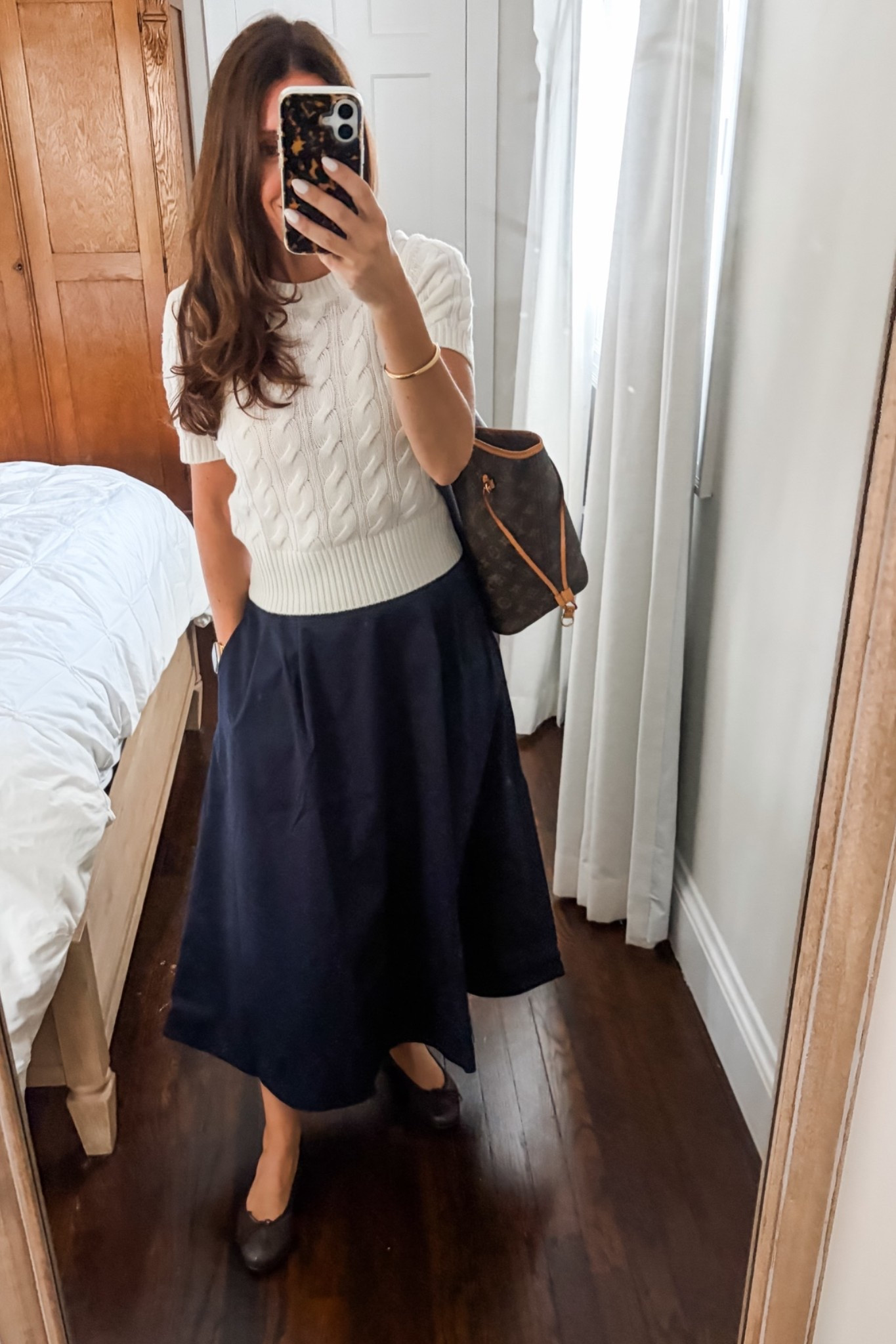 Teacher outfit from @Quince .  This skirt is a beautiful thick navy blue.  Wearing an xs in both shirt and cashmere cable knit sweater.

#LTKWorkwear #LTKOver40