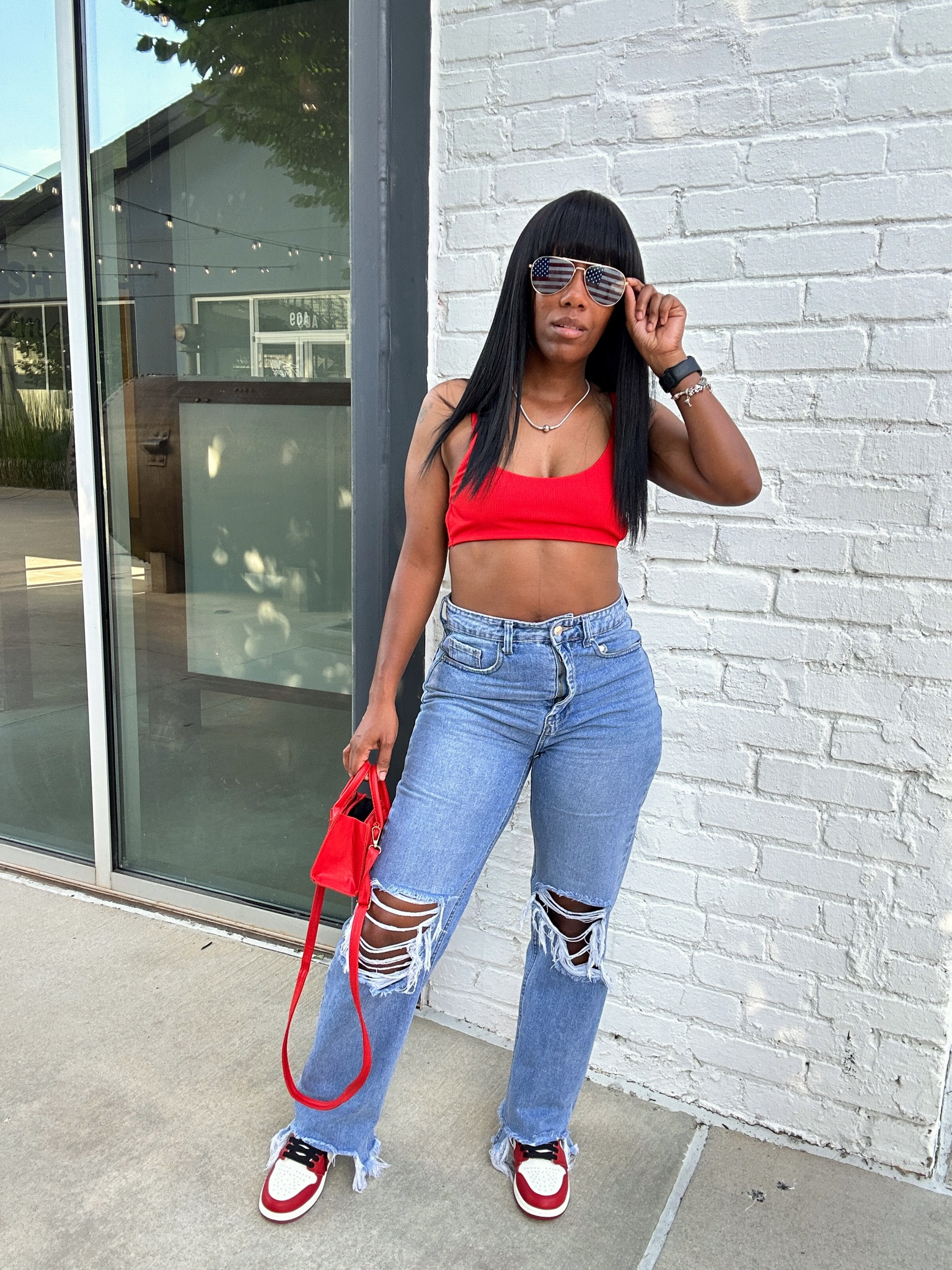 Casual outfit for 4th of July.

Red crop top and high waisted distressed jeans.

Styled with a red crossbody bag and flag aviators sunglassess

#LTKSeasonal #LTKFindsUnder50 #LTKStyleTip