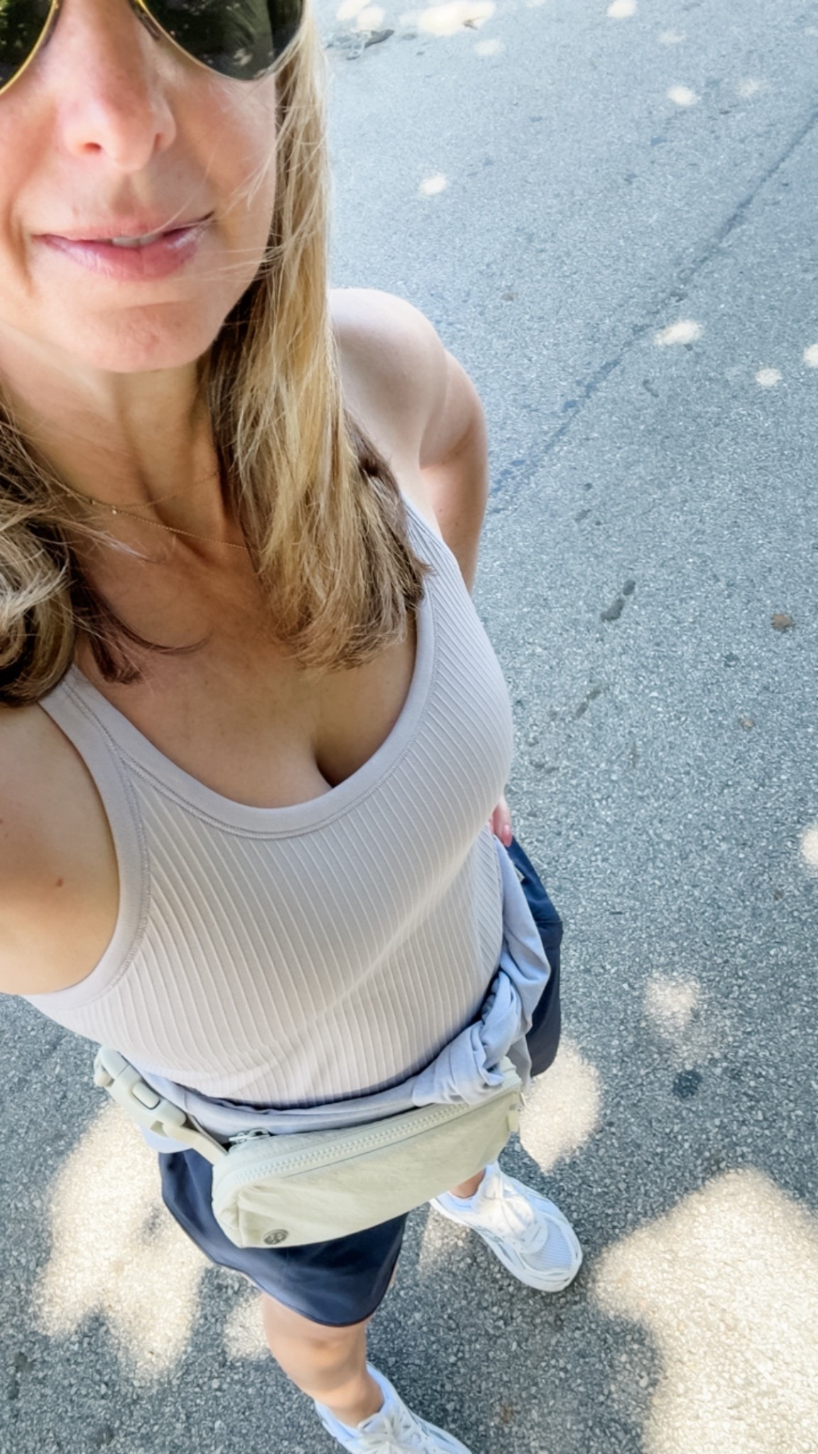 Outfit for a hot walk - ebb to street with Alo shorts

#LTKootd #LTKOver40